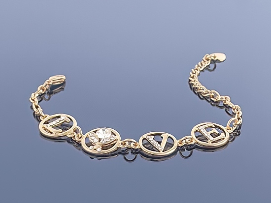 

Złota bransoletka Charms
