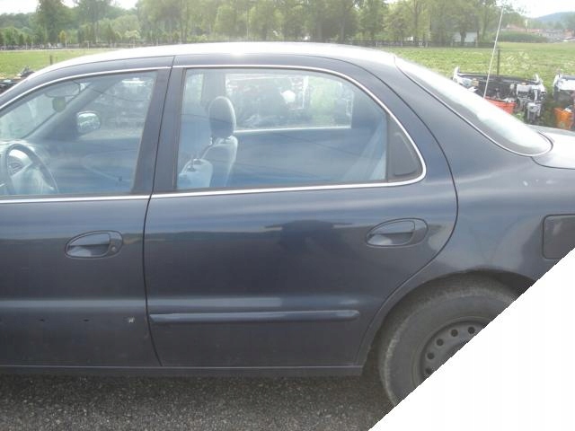 KIA CLARUS 1 i 2 95-01 ZAMEK LEWY TYLNY