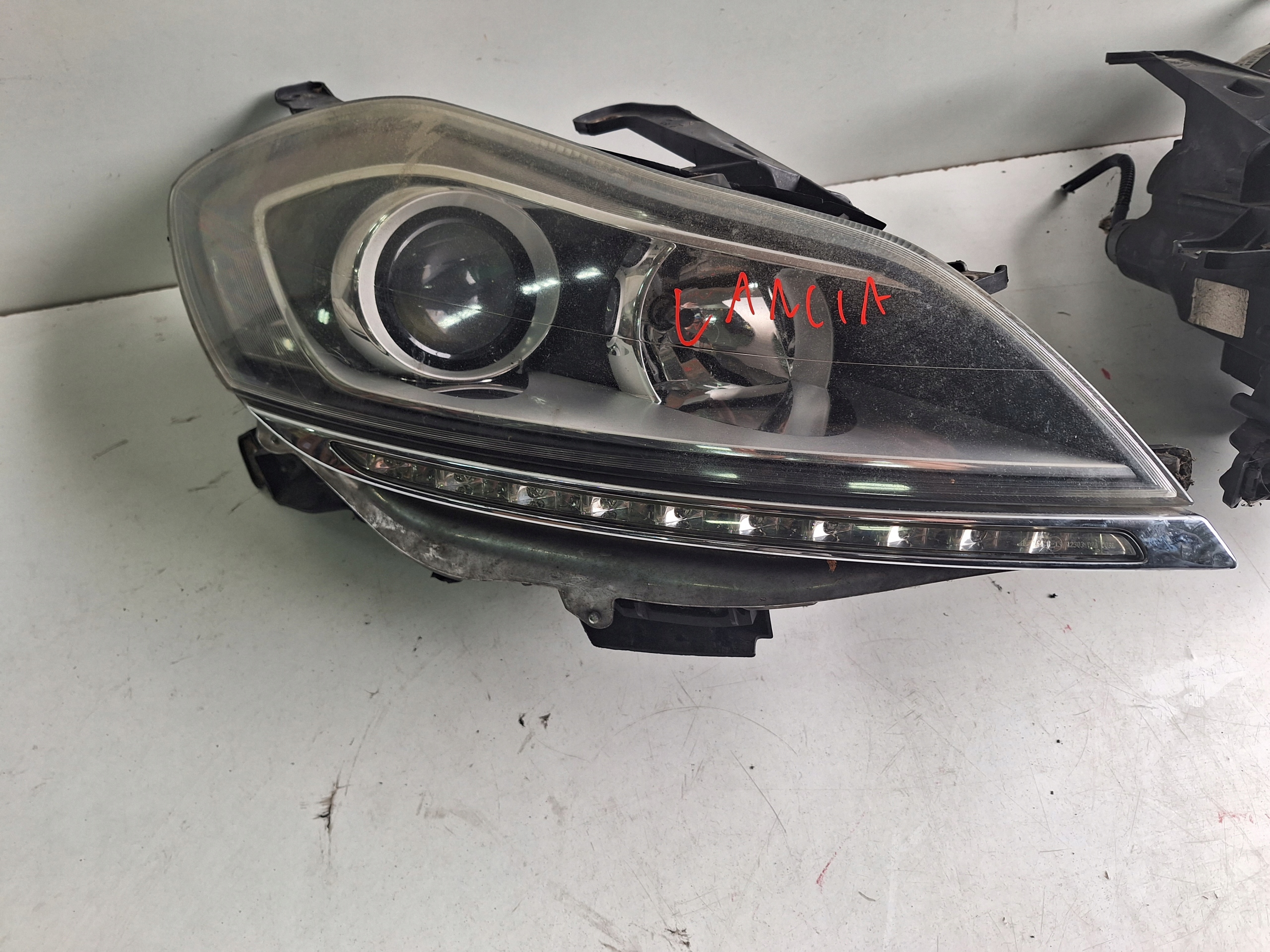 LANCIA DELTA 08-14 light left UK + LED
