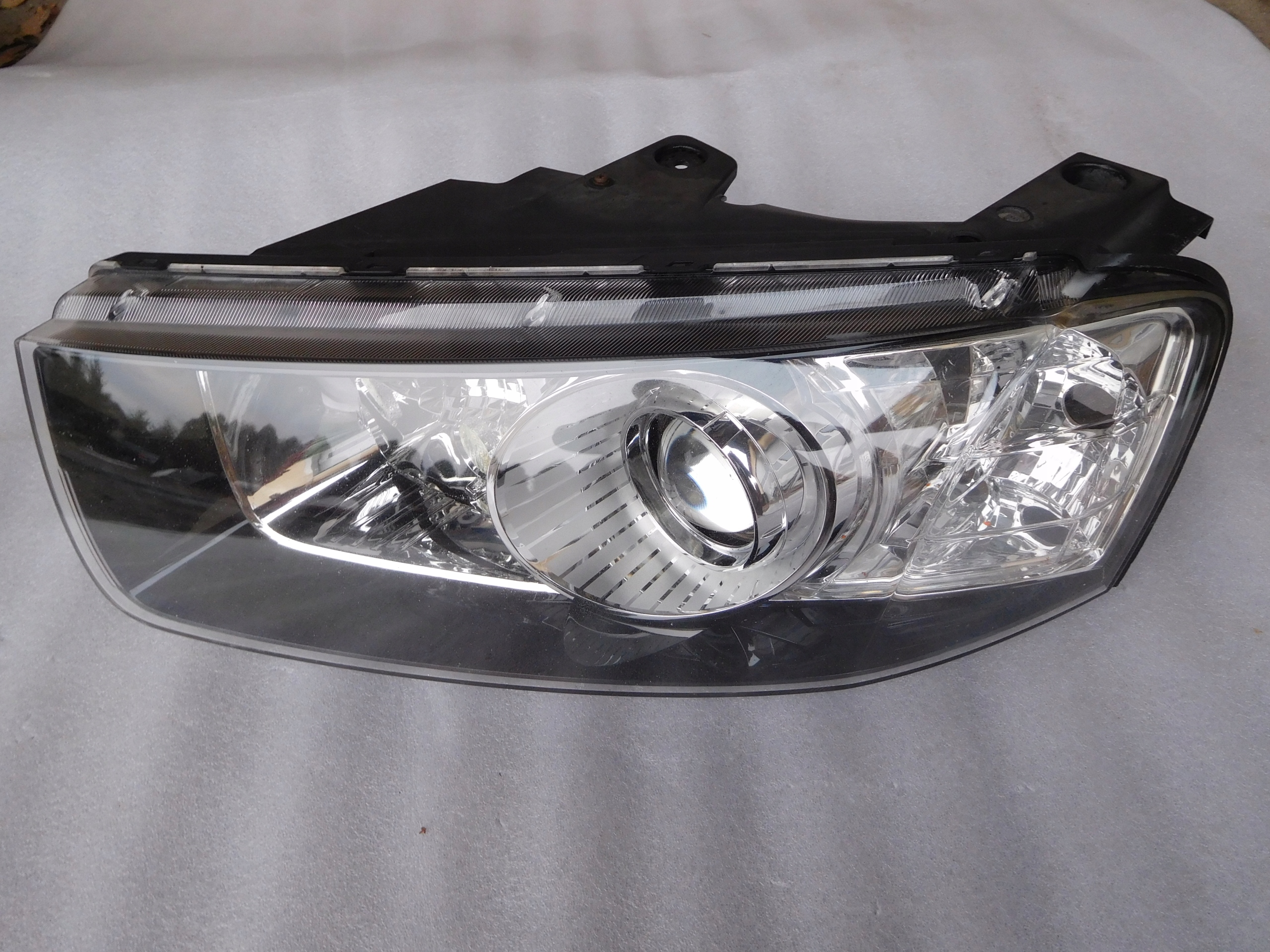 CHEVROLET CAPTIVA LIFT LEWA LAMPA SOCZEWKA EUROPA