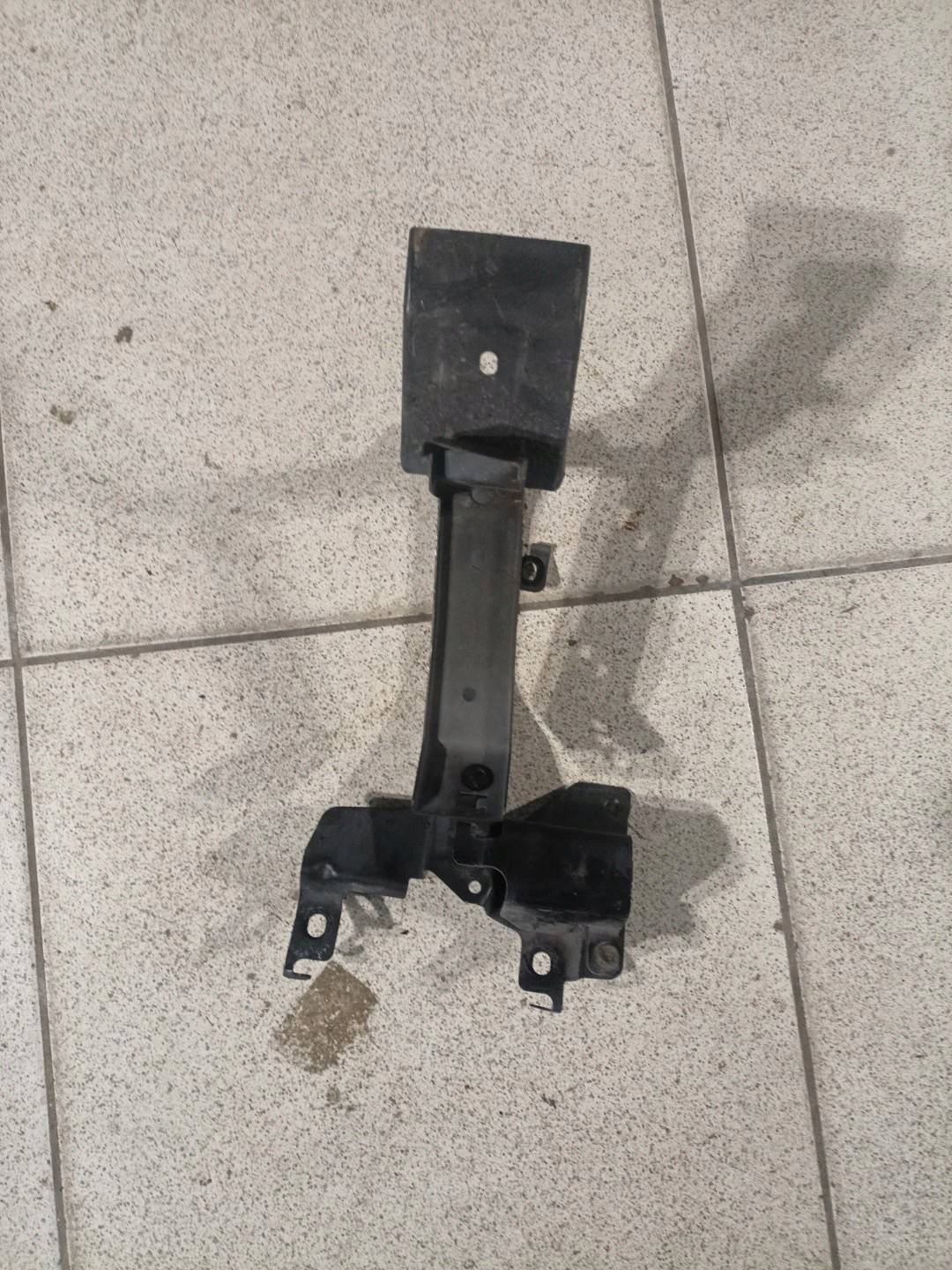 bracket of a lock bonnets Mazda CX-9 facelift 2010