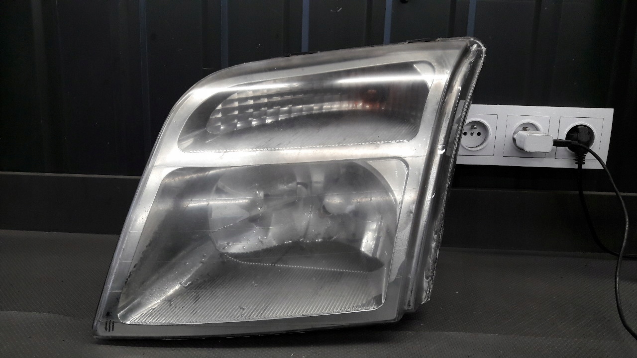 Фари лівий Ford Transit Connect 02-07r