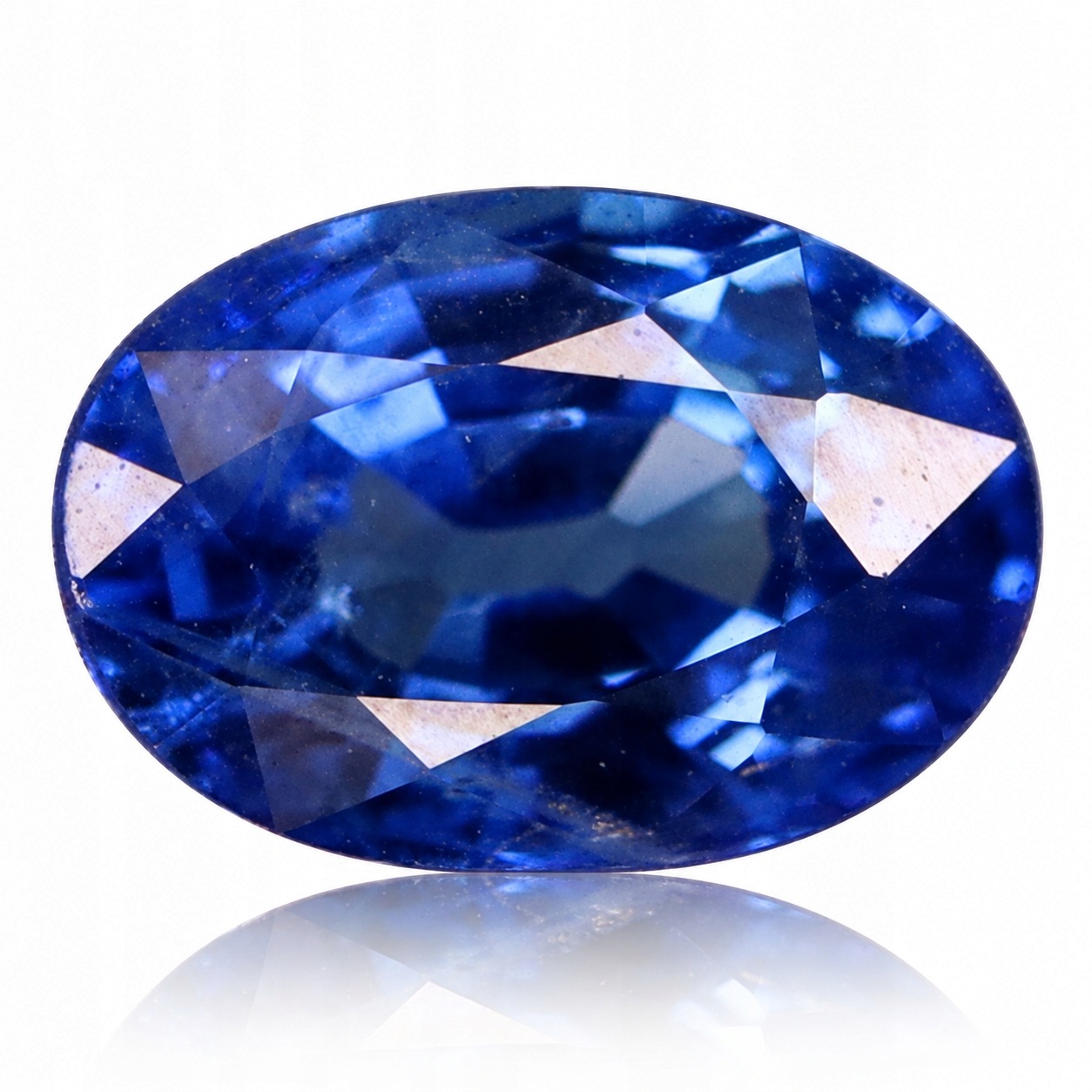 Přírodní safír 0.75 ct modrý „Cornflower“ Ovál SI1 certifikát Wbd