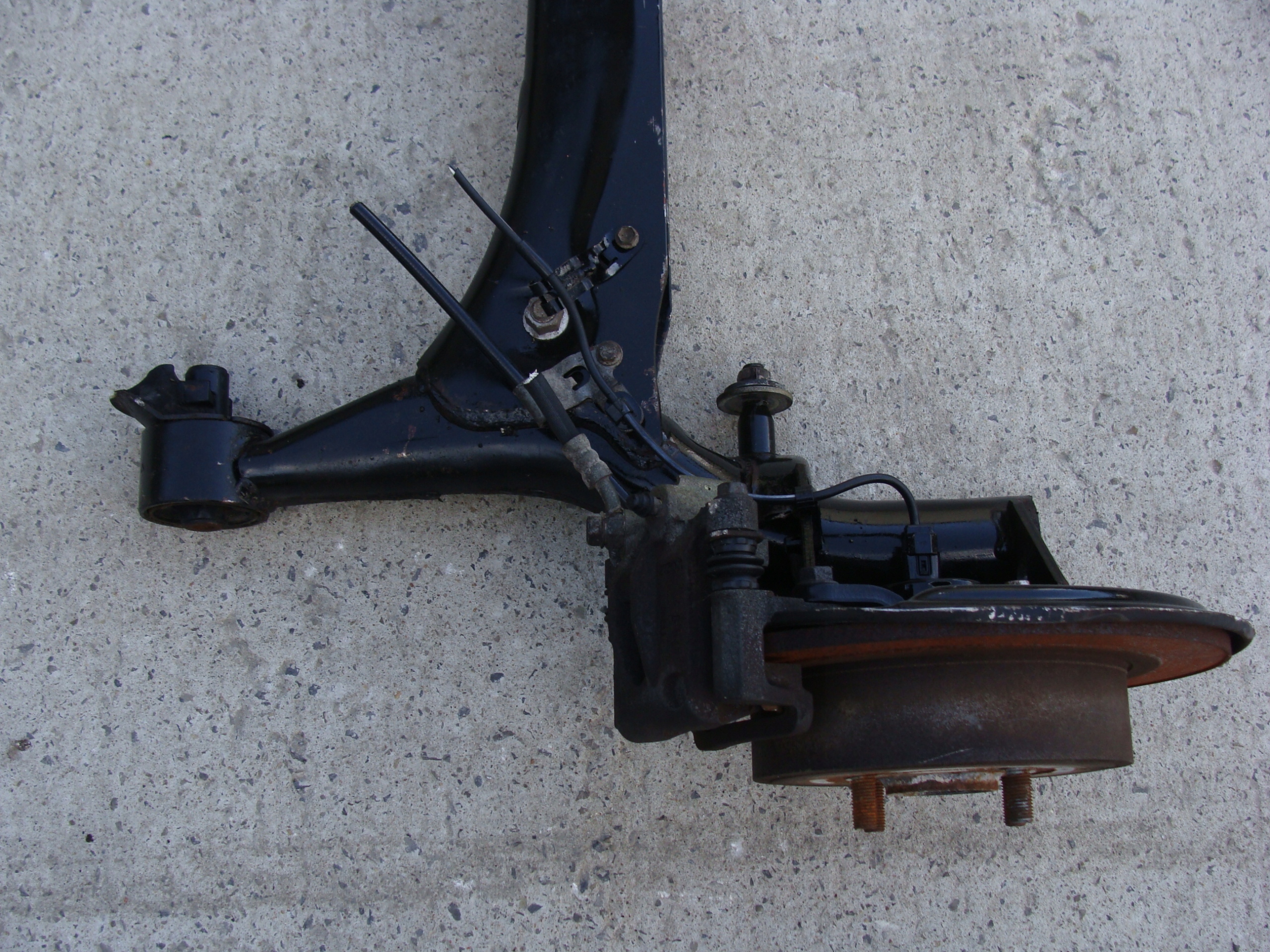 BELKA OŚ TYLNA TOYOTA COROLLA E12 !!! Producent części Toyota OE