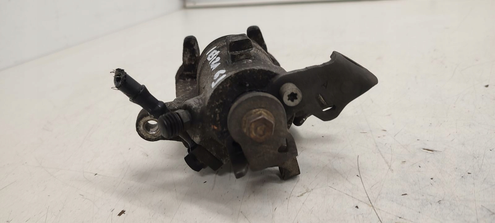 caliper rear part rear left Seat Ibiza 6J 5D 1,6 TDI