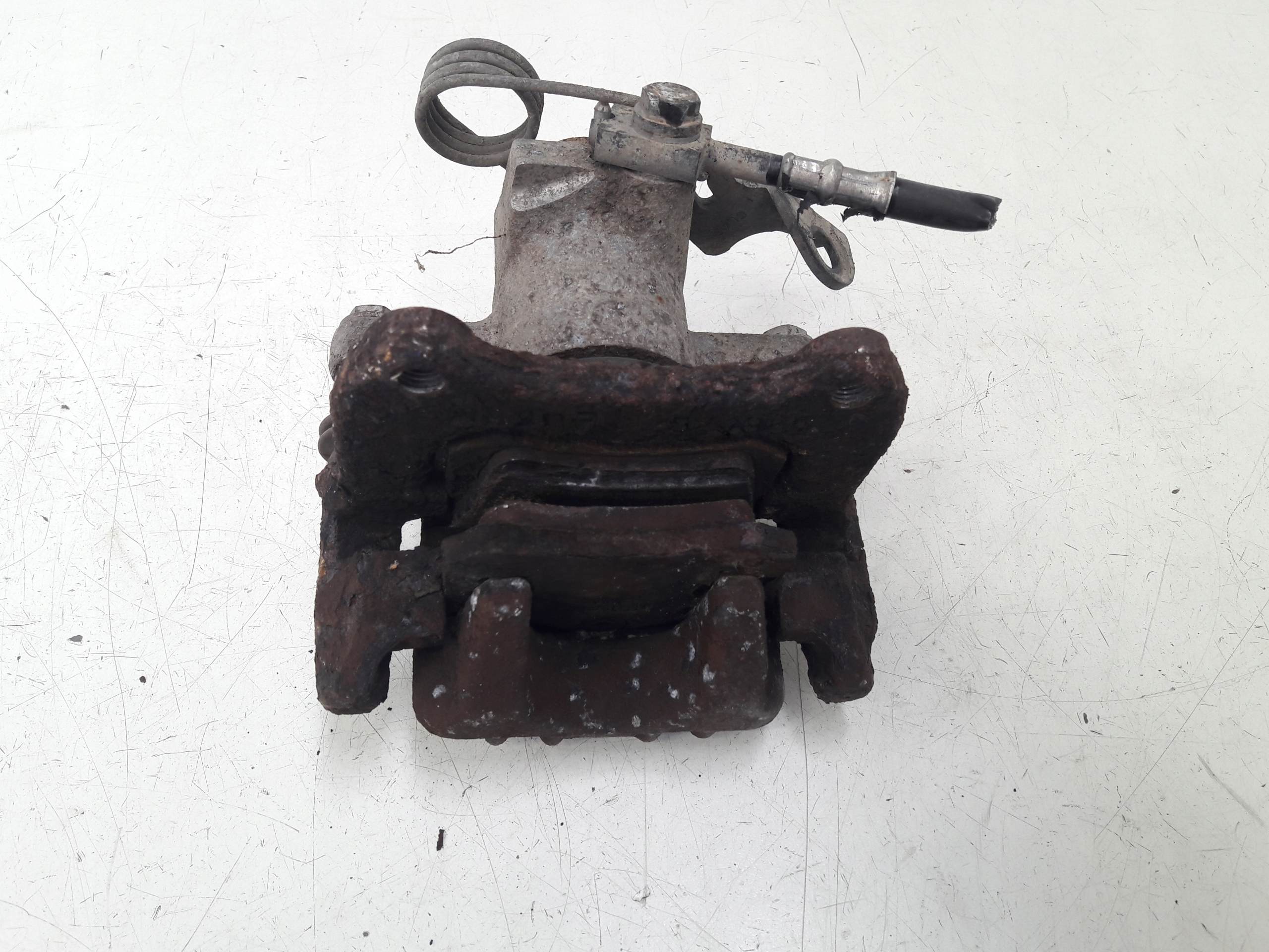 caliper left rear part Skoda Superb