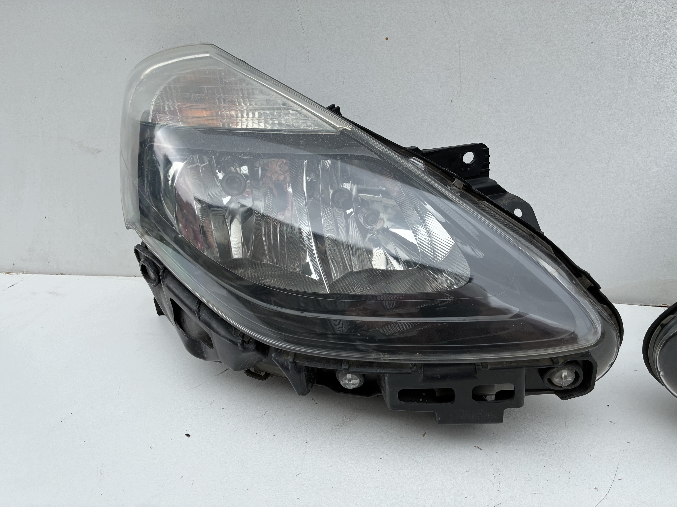Reflektor light front front right left Renault Clio III Lift 09-12r. Eu
