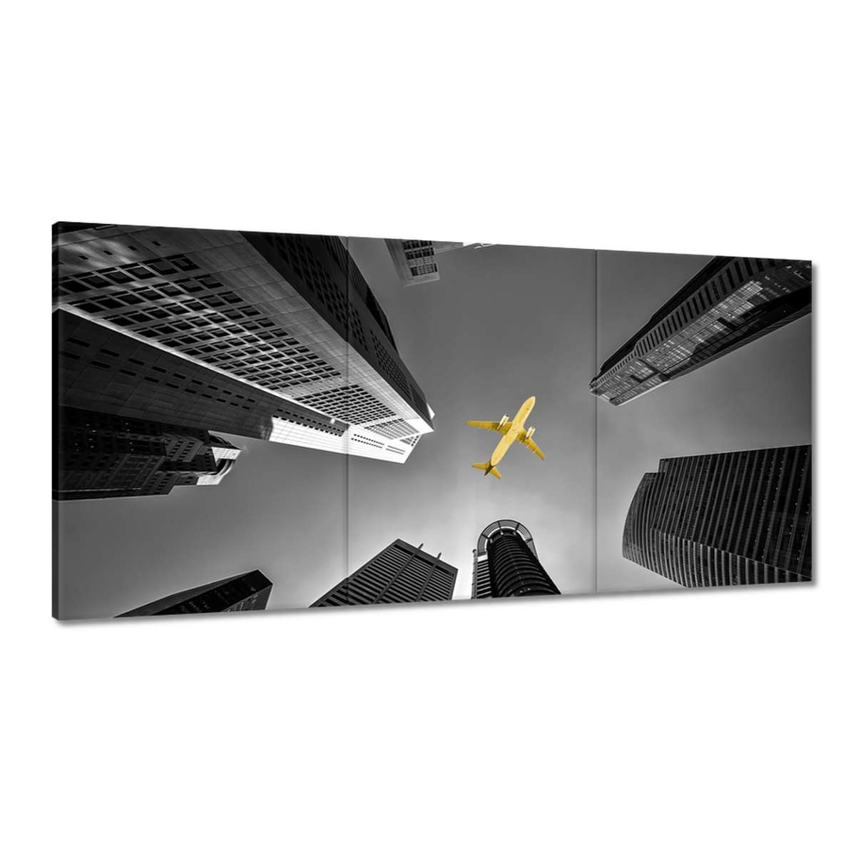 Obrazy 180x90 Žlté lietadlo nad mestom