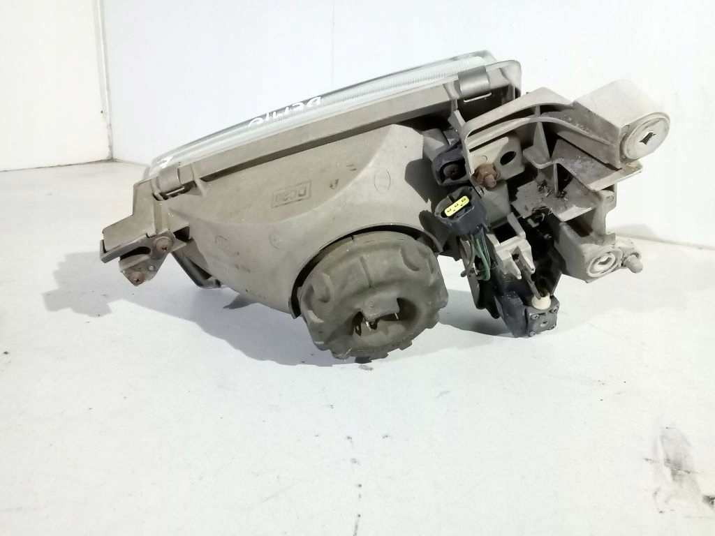 Mazda Demio and light right front front