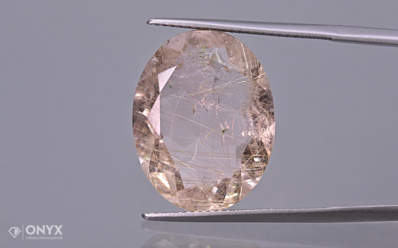 Křemen s rutilem fazetovaný ovál 20x15,5 mm