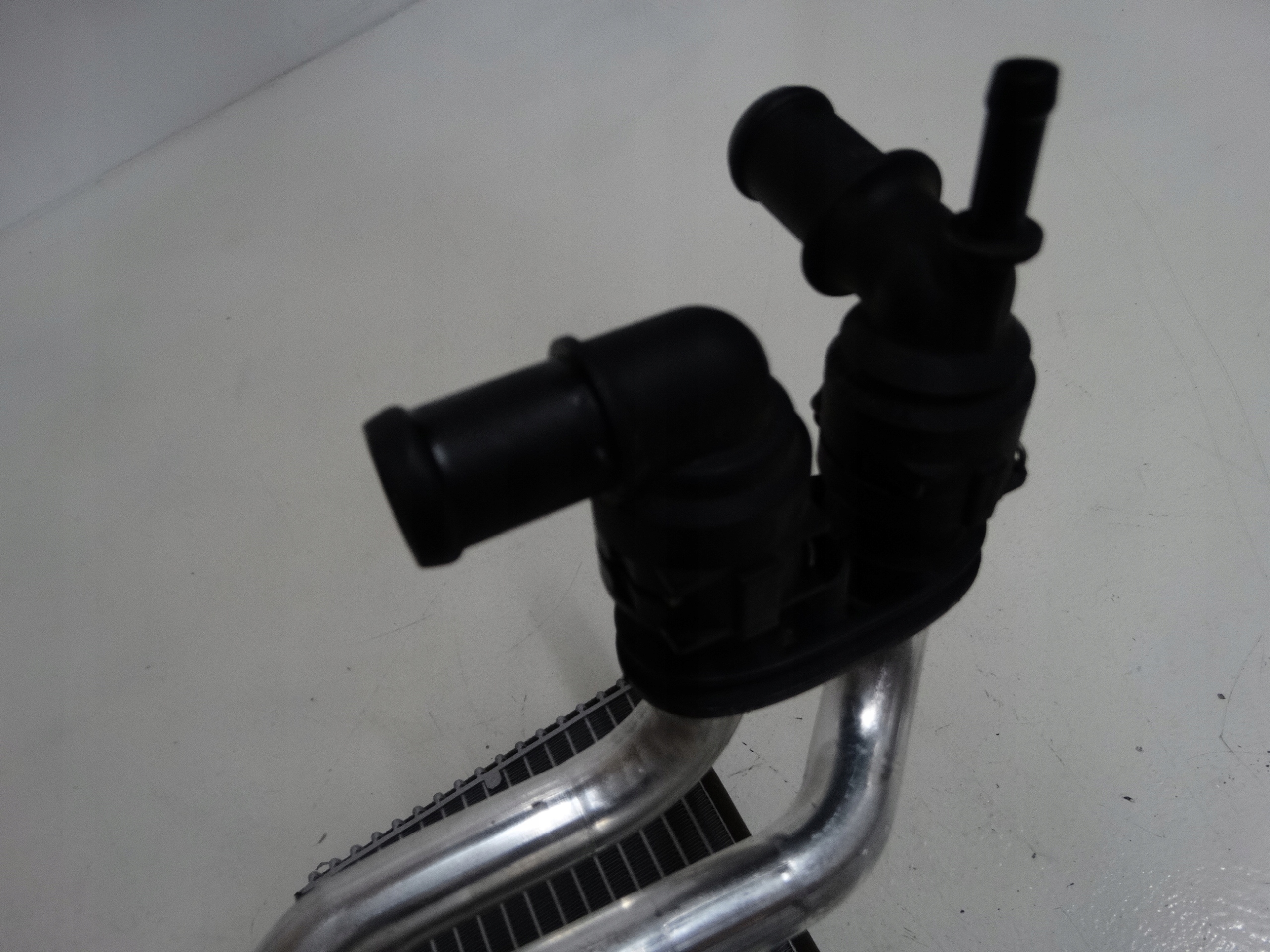 chladič topení vody VW GOLF V 1K0819031