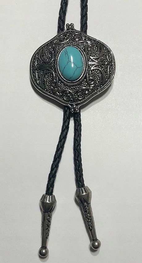 Turkus na štítu s geometrickým vzorem, pletenina, přírodní kůže