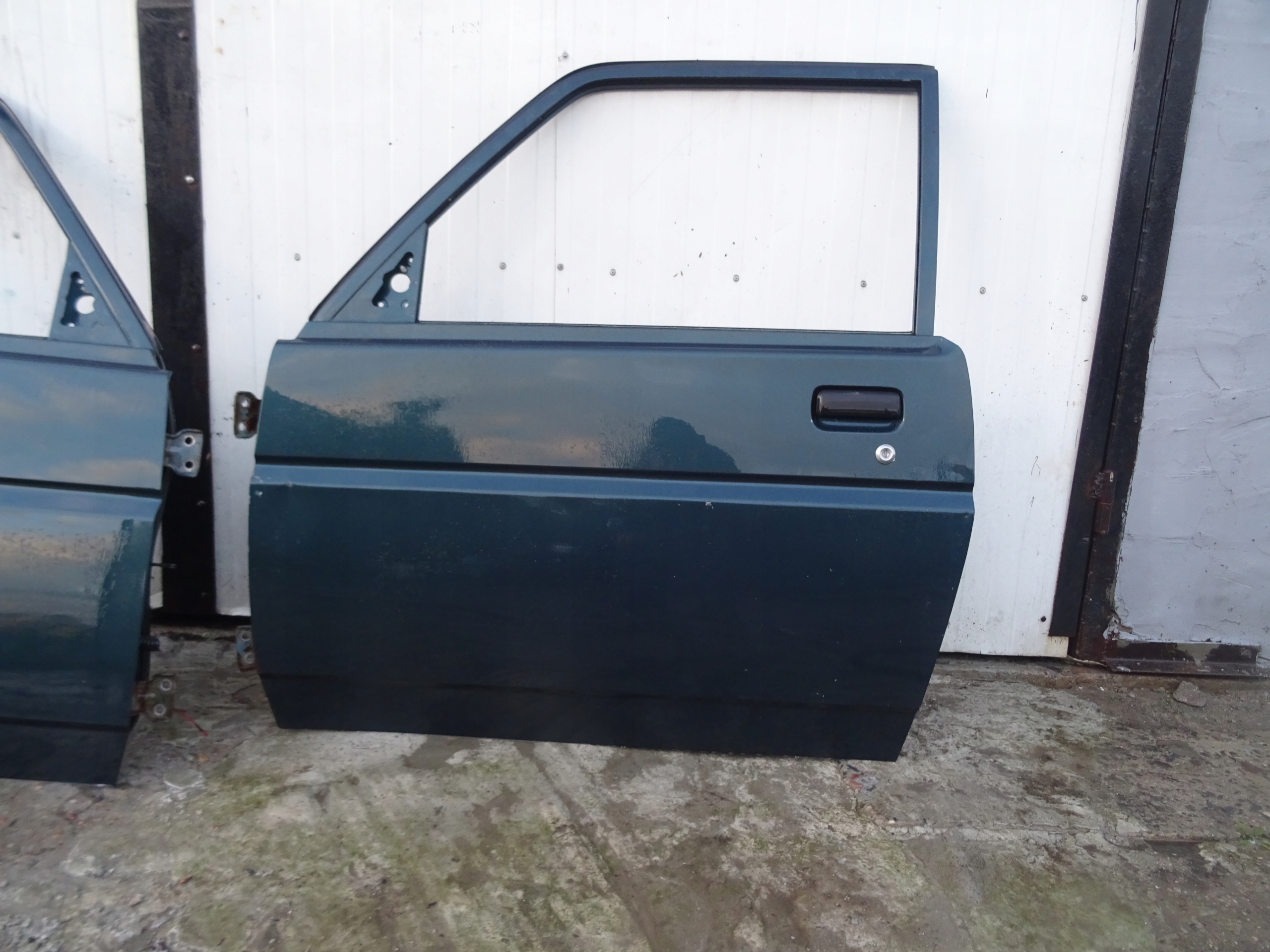 DAIHATSU FEROZA DRZWI LEWY PRZÓD LEWE PRZEDNIE