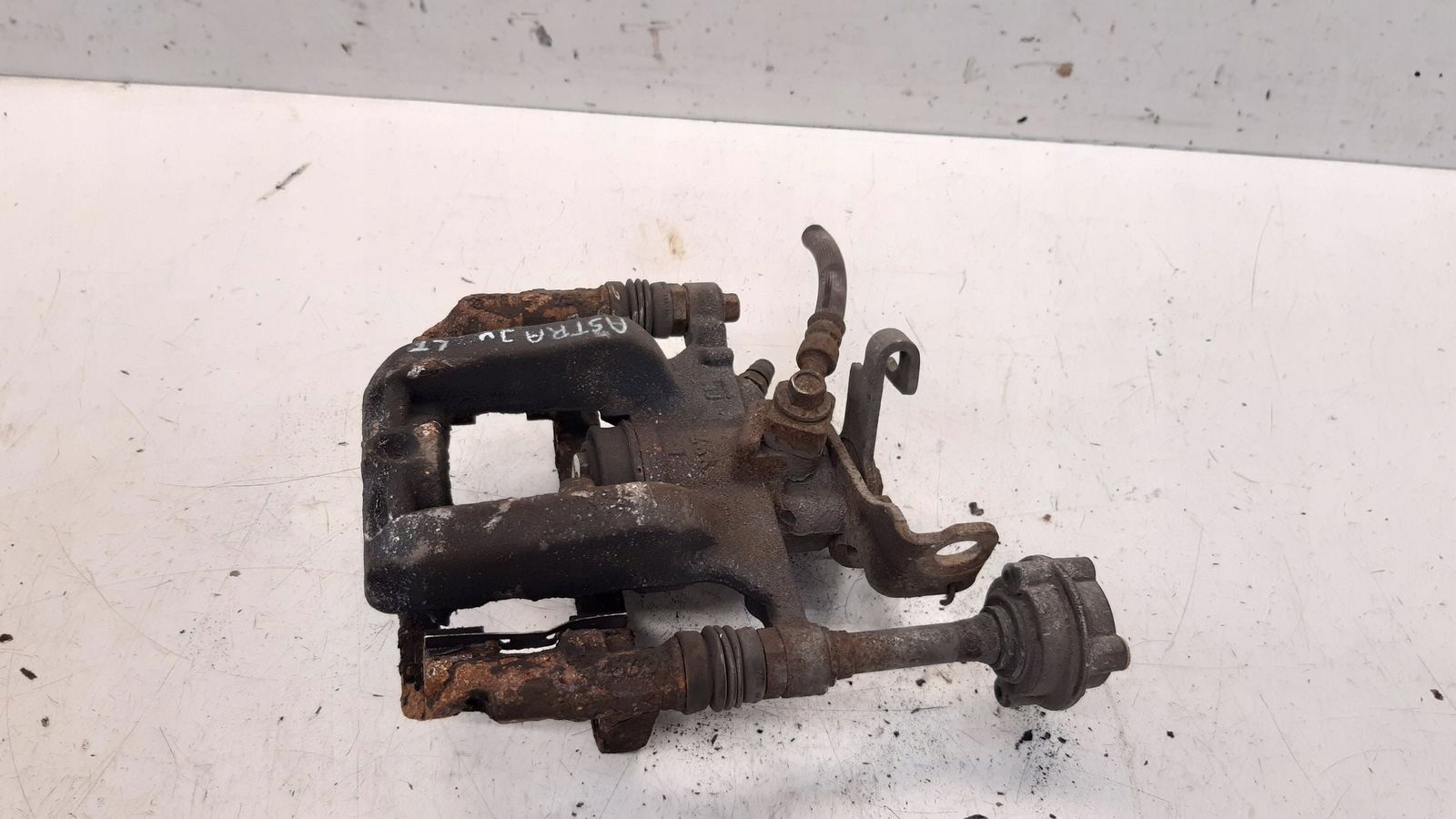 caliper rear part rear left Opel Astra J 2,0 CDTI
