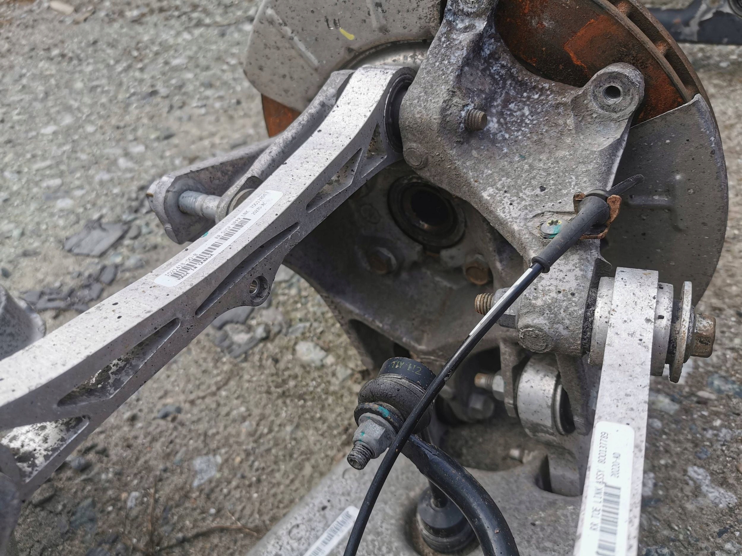 Tesla Model S ZAWIESZENIE TYŁ TYLNE 1009826-00-A 14r. Jakość części (zgodnie z GVO) O - oryginał z logo producenta pojazdu (OE)