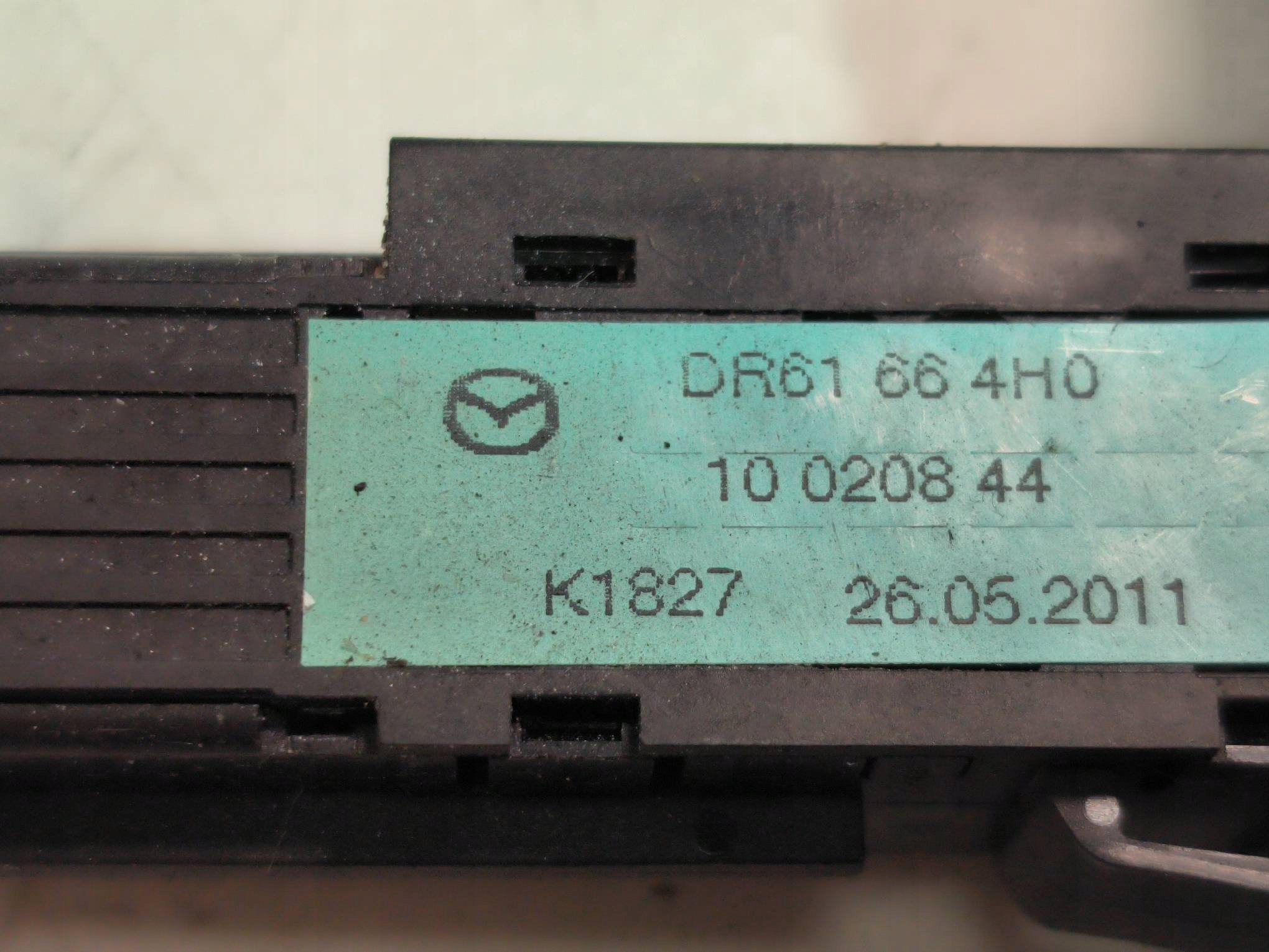 tlačítko DR61664H0 MAZDA 2 II