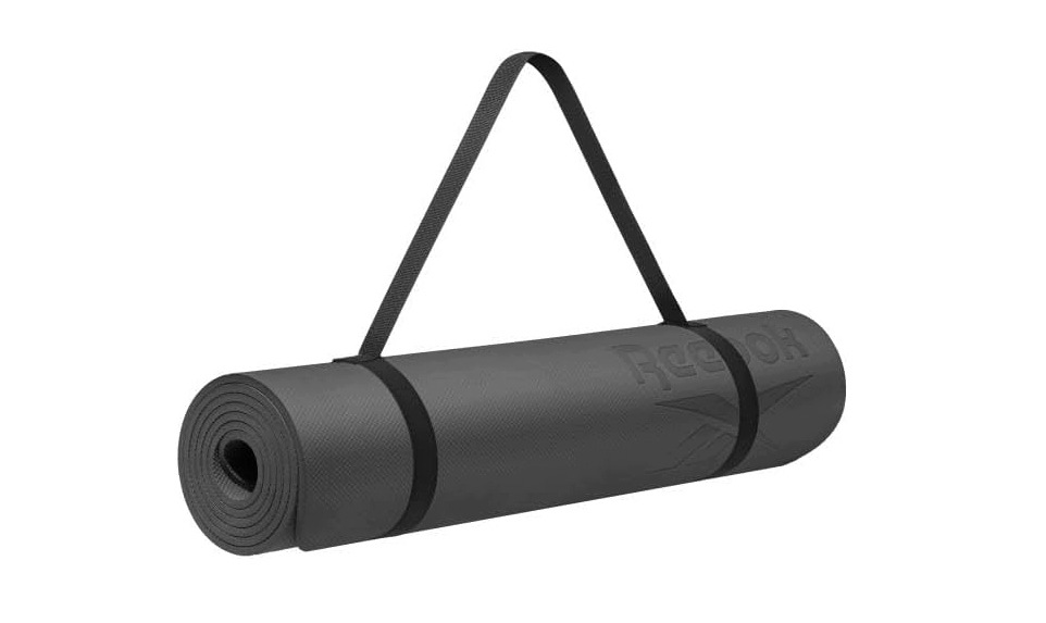 Mata do jogi Reebok 6 mm 183 x 61 cm z paskiem do przenoszenia