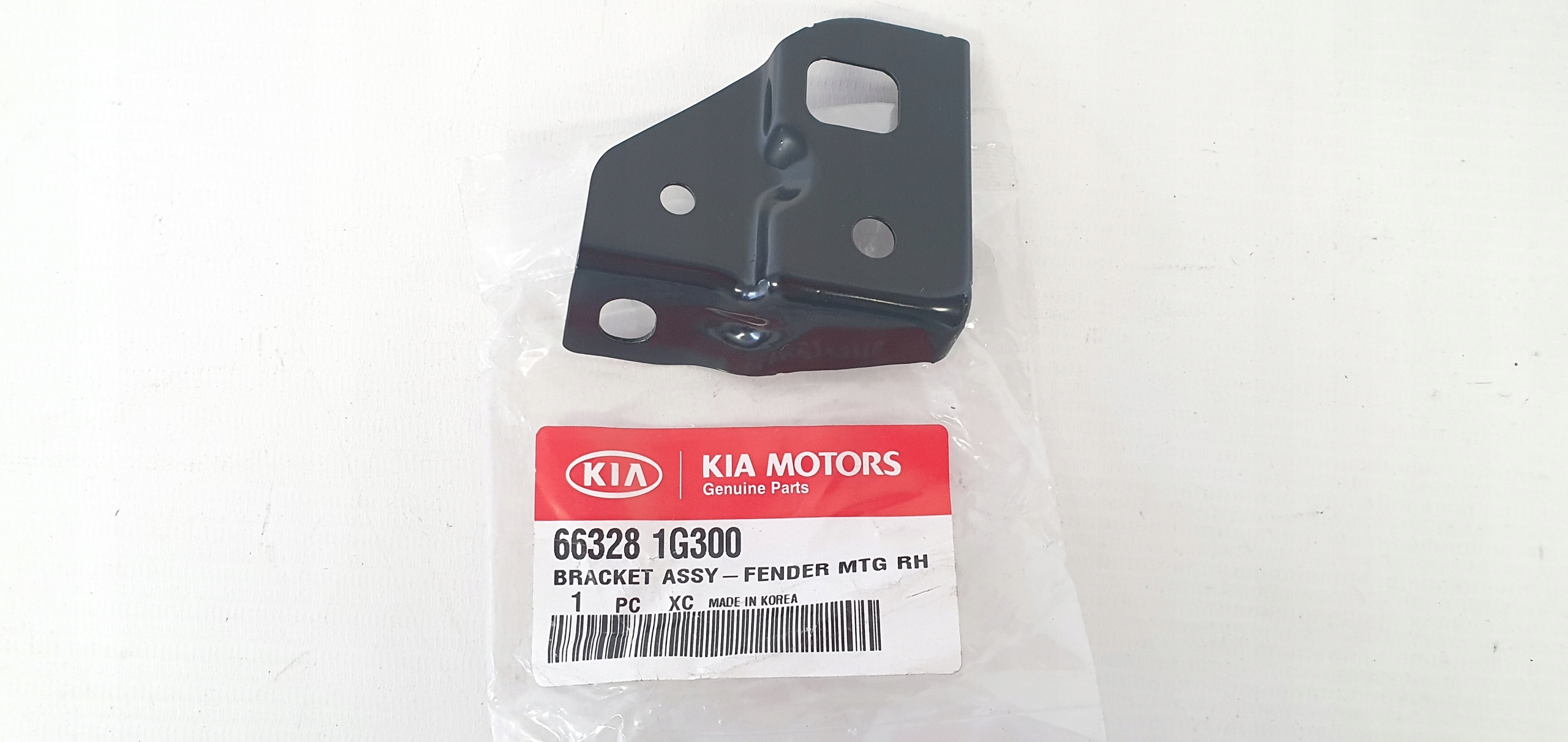 Wspornik mocowanie błotnika Kia Rio 06-11 OE