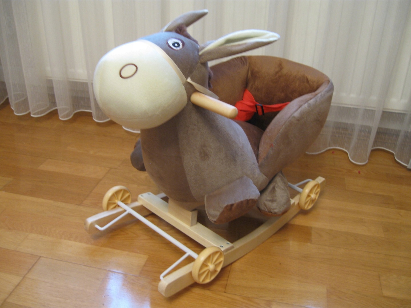 ŚPIEWAJĄCY BUJAK na BIEGUNACH PŁOZACH i KÓŁKACH 3w1 OSIOŁEK GRA MELODIE Wiek dziecka 12 m +