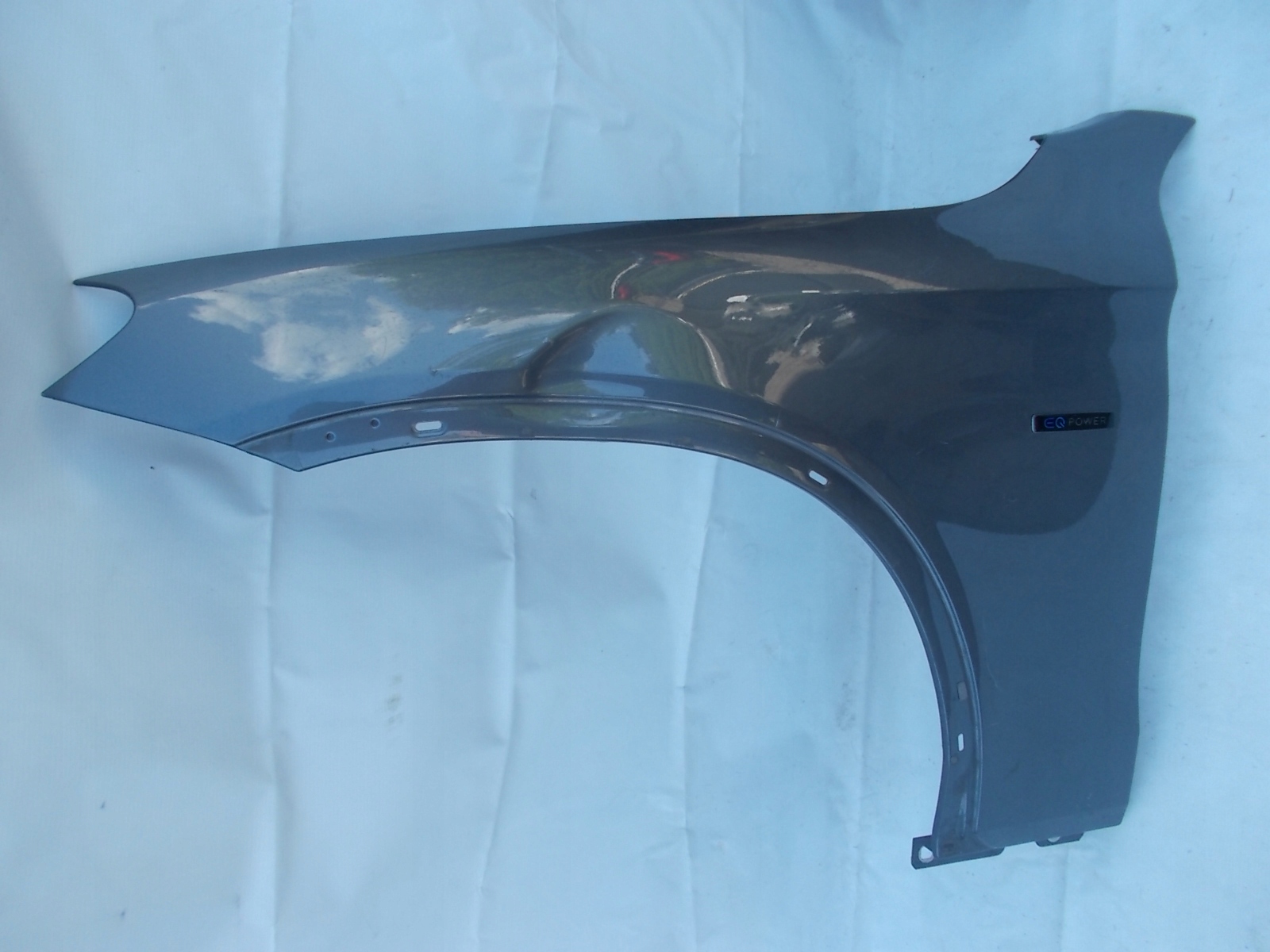 MERCEDES GLC W253 BŁOTNIK LEWY PRZÓD 2538810101