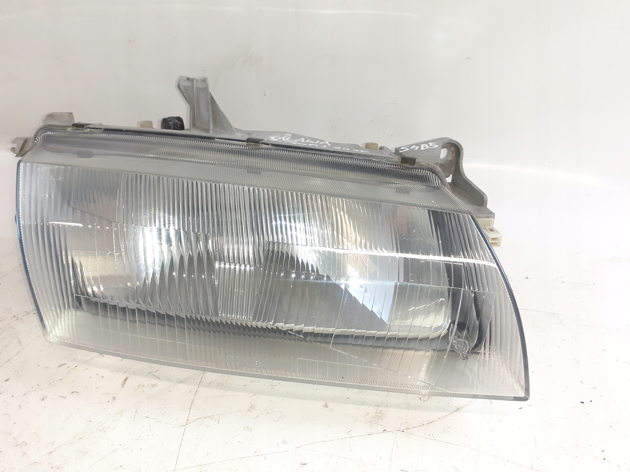 light right front Mazda 323F
