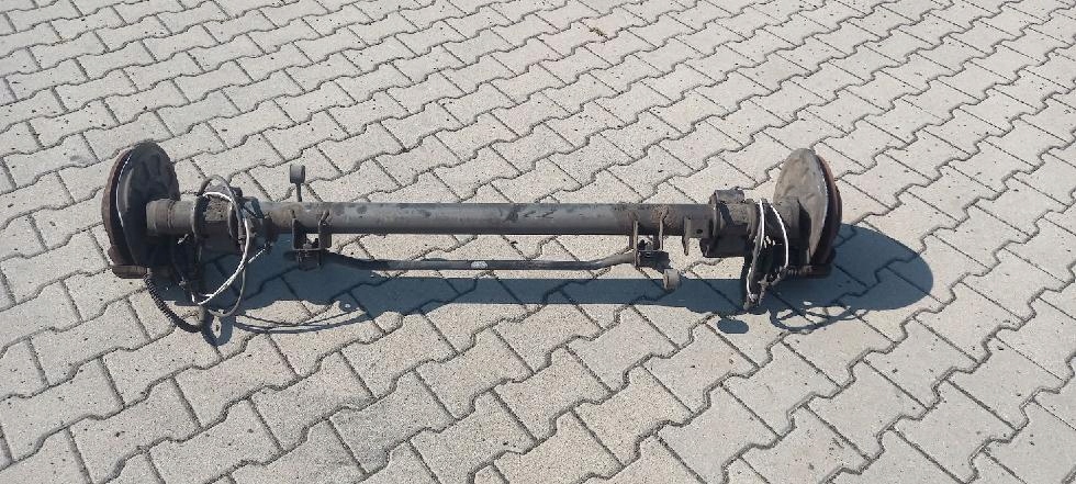 VW CADDY 2K5 ZAWIESZENIE TYŁ TYLNE BELKA