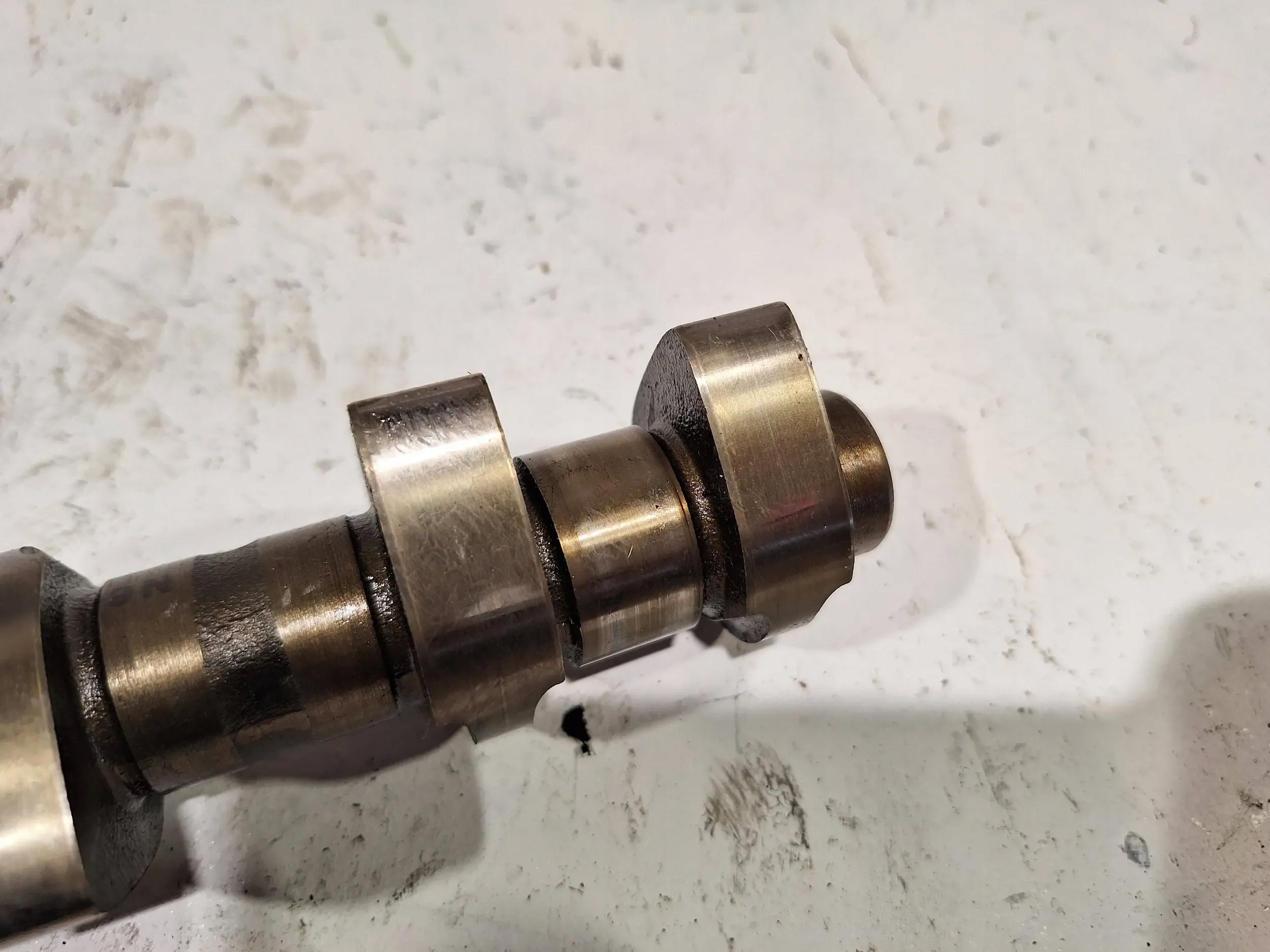 Wałek rozrządu wydechowy 0097798 Opel Astra H Z18XER za