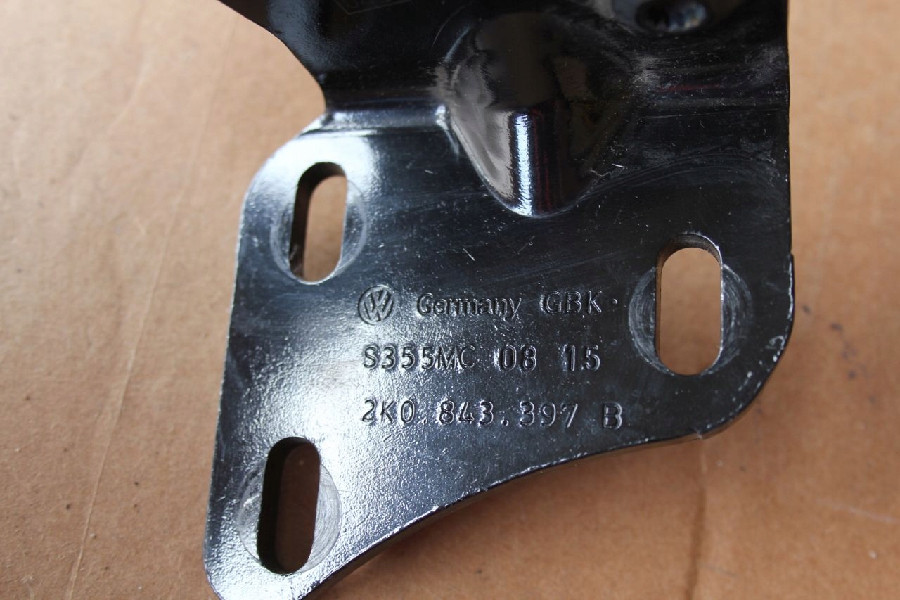 UCHWYT ROLKA DRZWI LEWY BOK VW CADDY IV 2K0843397B Part manufacturer Volkswagen OE