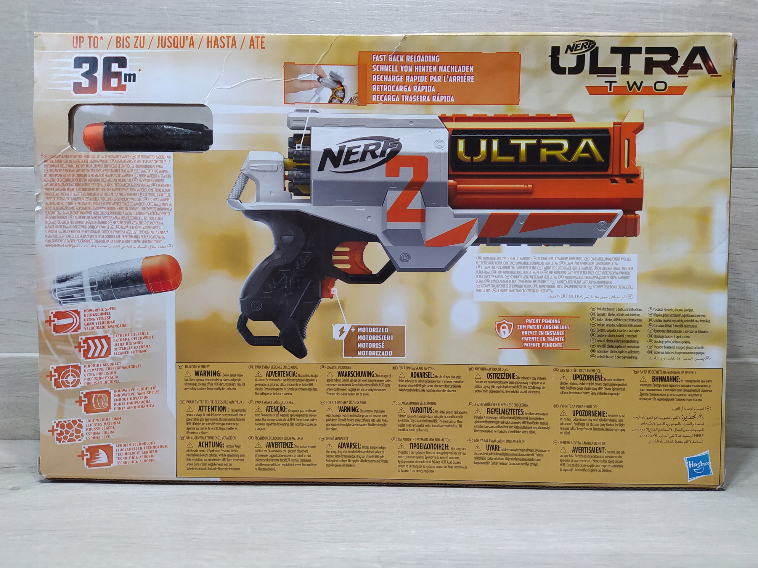 Nerf Ultra Two E7921 Wyrzutnia automatyczna OPIS Kolor dominujący odcienie pomarańczowego