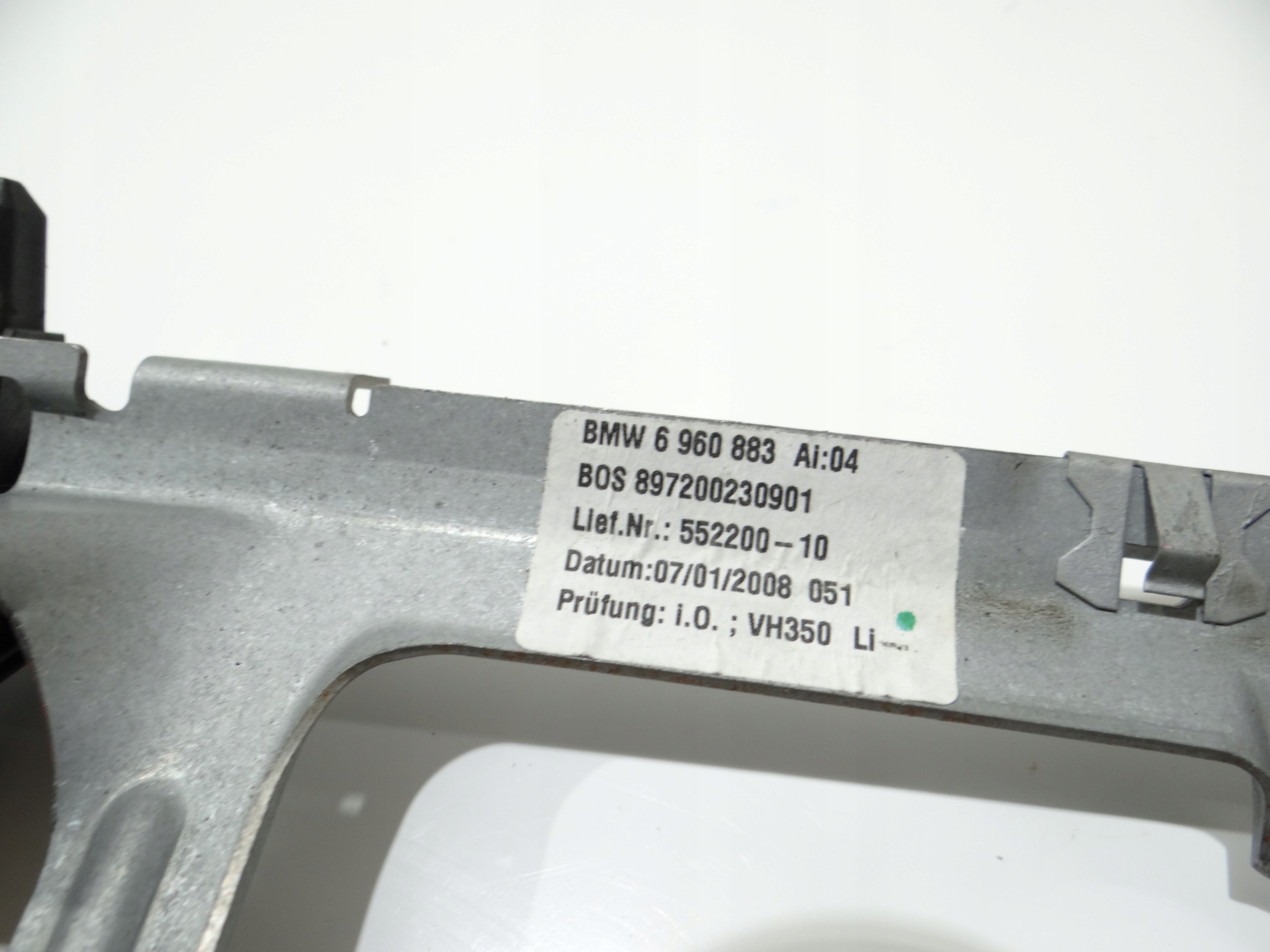 bracket ROLETY left rear part BMW E61 OE 6960883