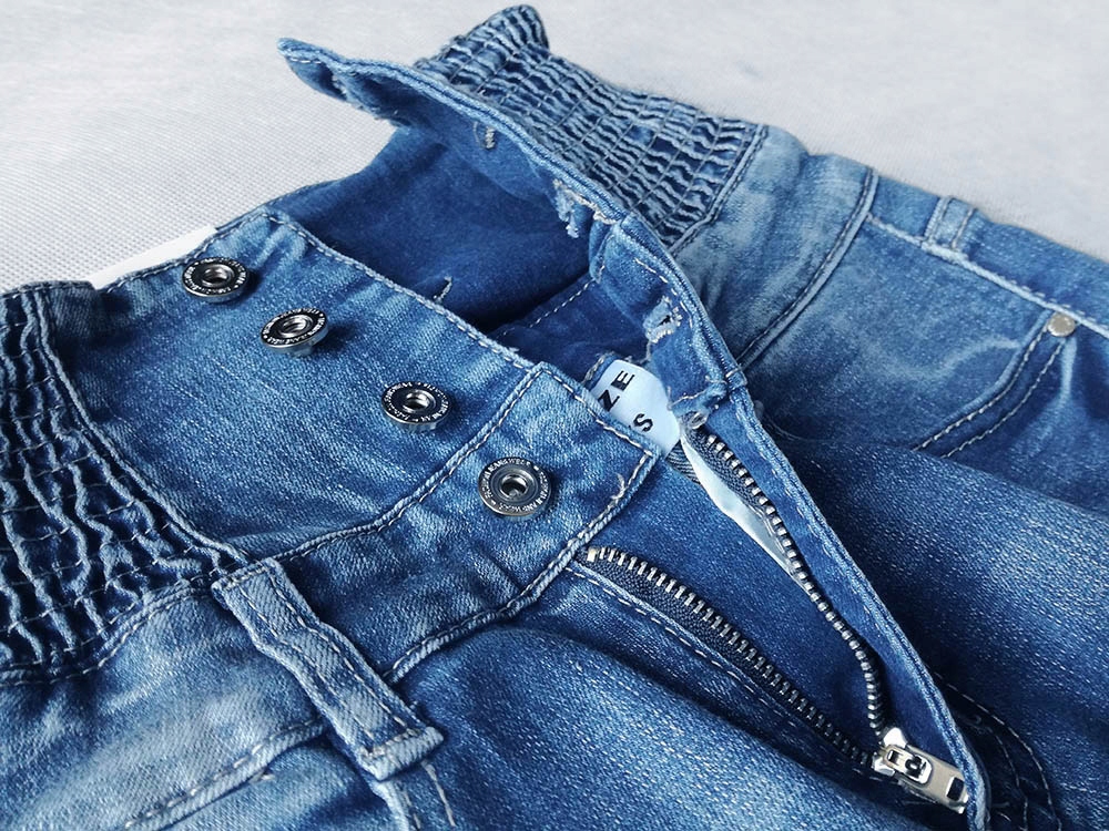 SPODNIE WYSOKI STAN MODELUJĄCE SZEROKI PAS JEANS Płeć kobieta