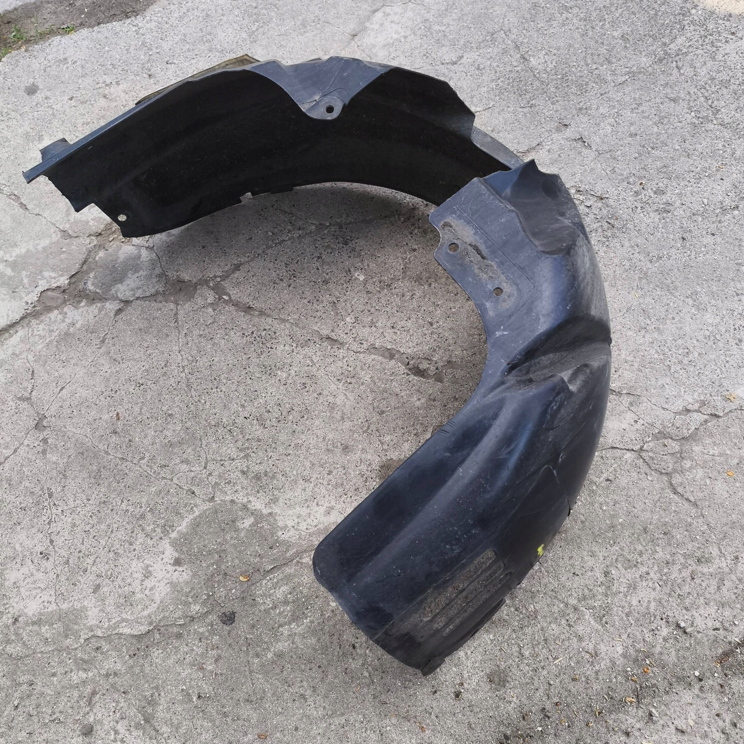 Ford Fiesta MK7 LIFT mudguard front left oryginalne
