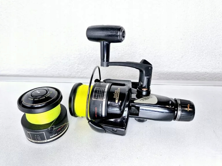 KOŁOWROTEK LONG CAST DAIWA PG2050 + SZPULA