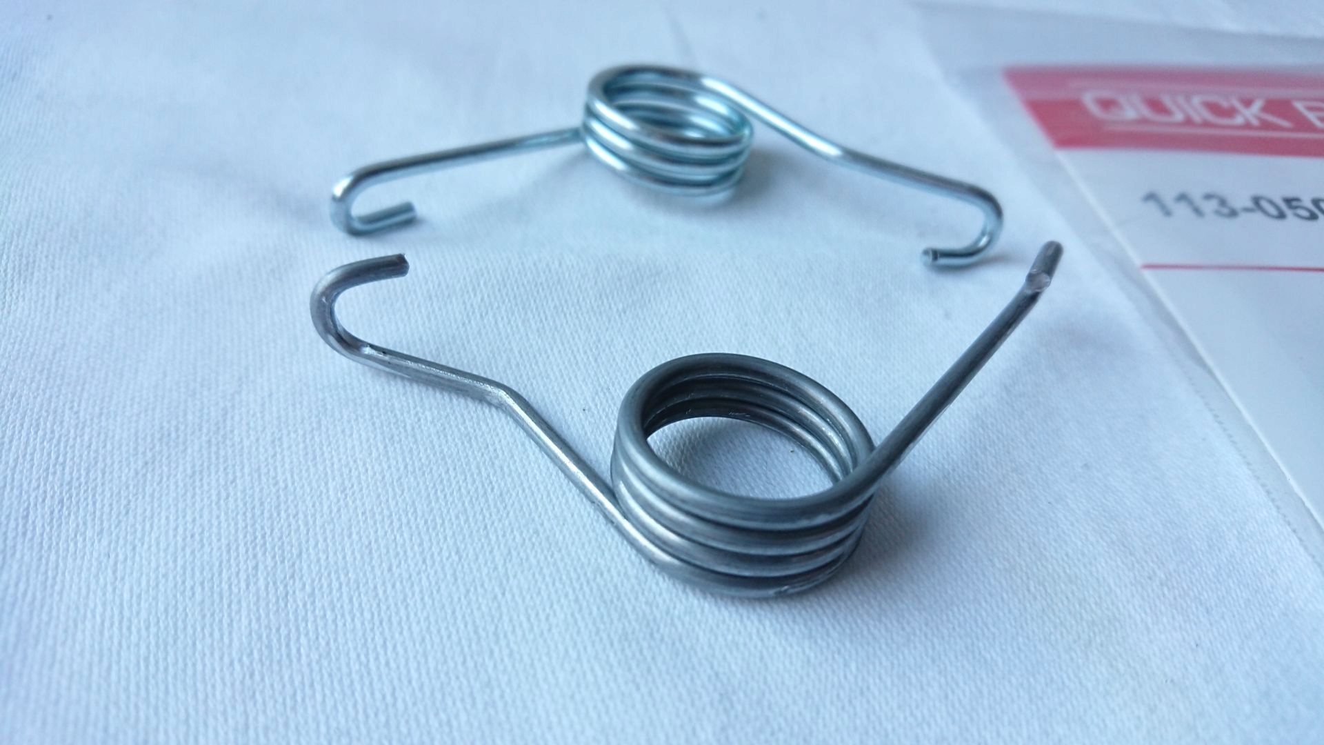 SPRĘŻYNA ZACISKU HAMULCOWEGO TYŁ RENAULT TRAFIC II Producent części Quick Brake