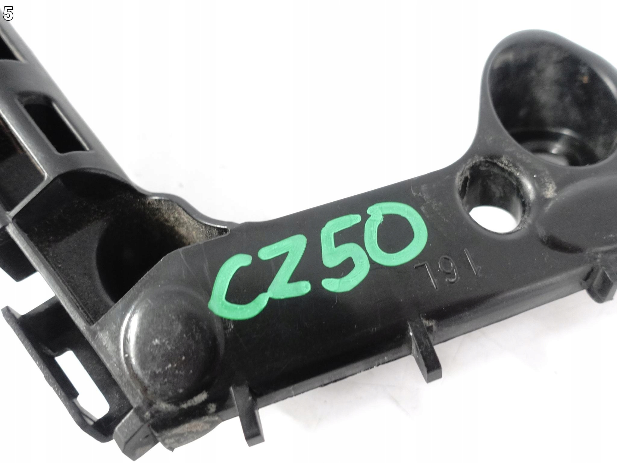 TOYOTA COROLLA E21 XII 18- support holder W bumper front left ORG