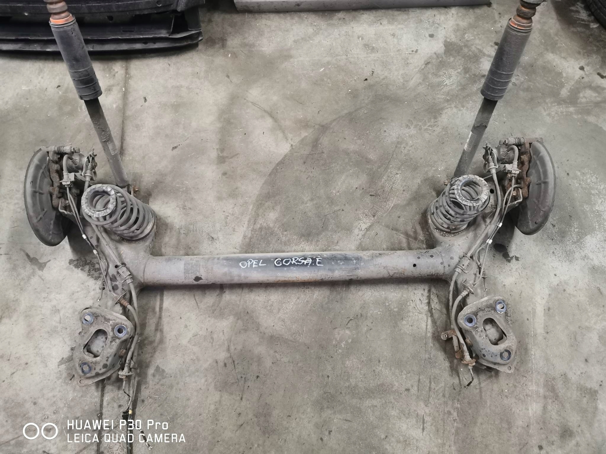 BELKA ZAWIESZENIA TYŁ OPEL CORSA E 1.4