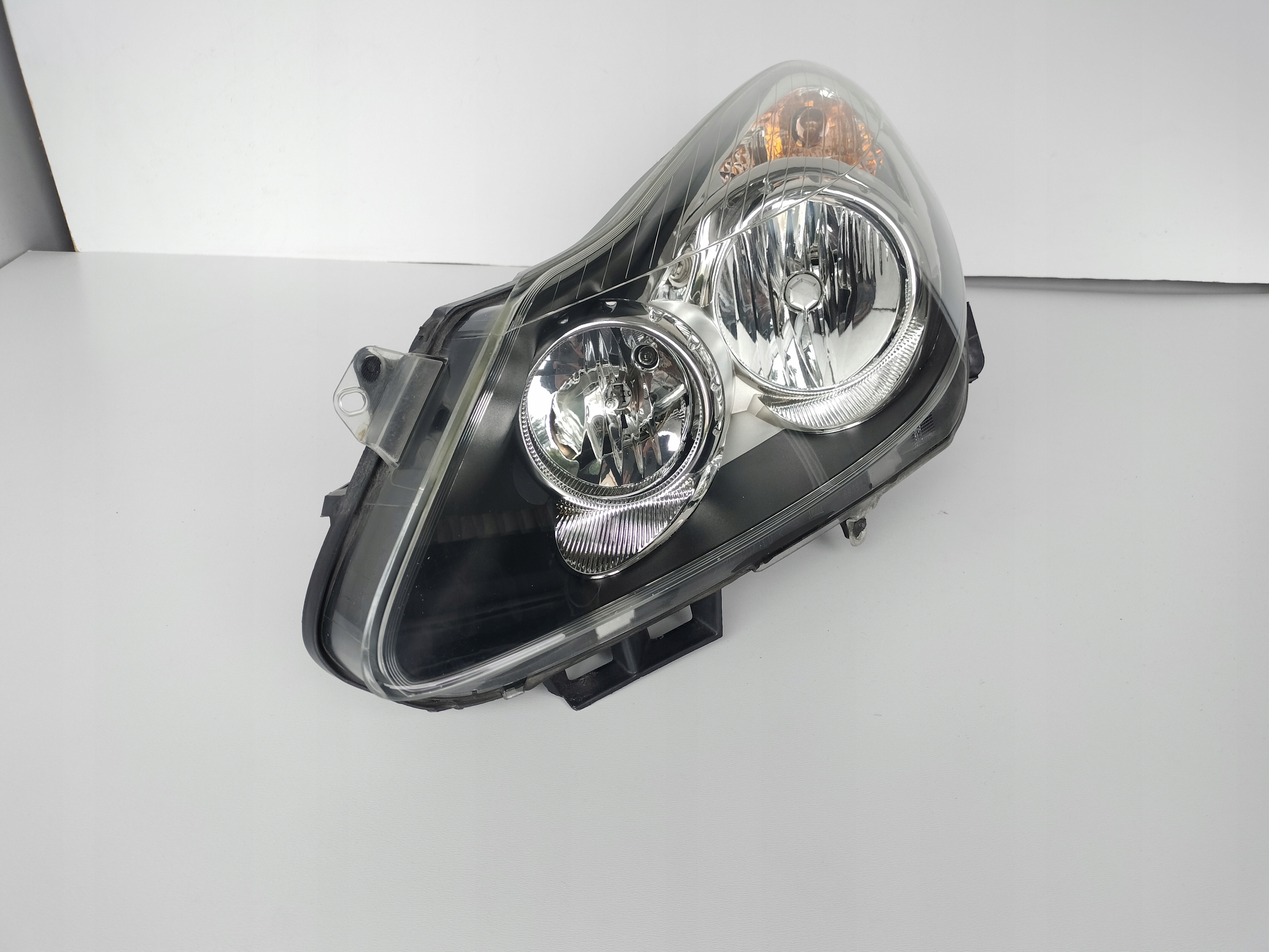 light left REFLEKTOR OPEL CORSA D 06-11 CIEMNA