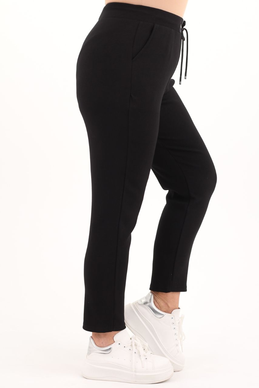 WYGODNE SPODNIE DRESOWE DAMSKIE NA GUMCE Z KIESZENIAMI ELASTYCZNE Marka FEMIMODA