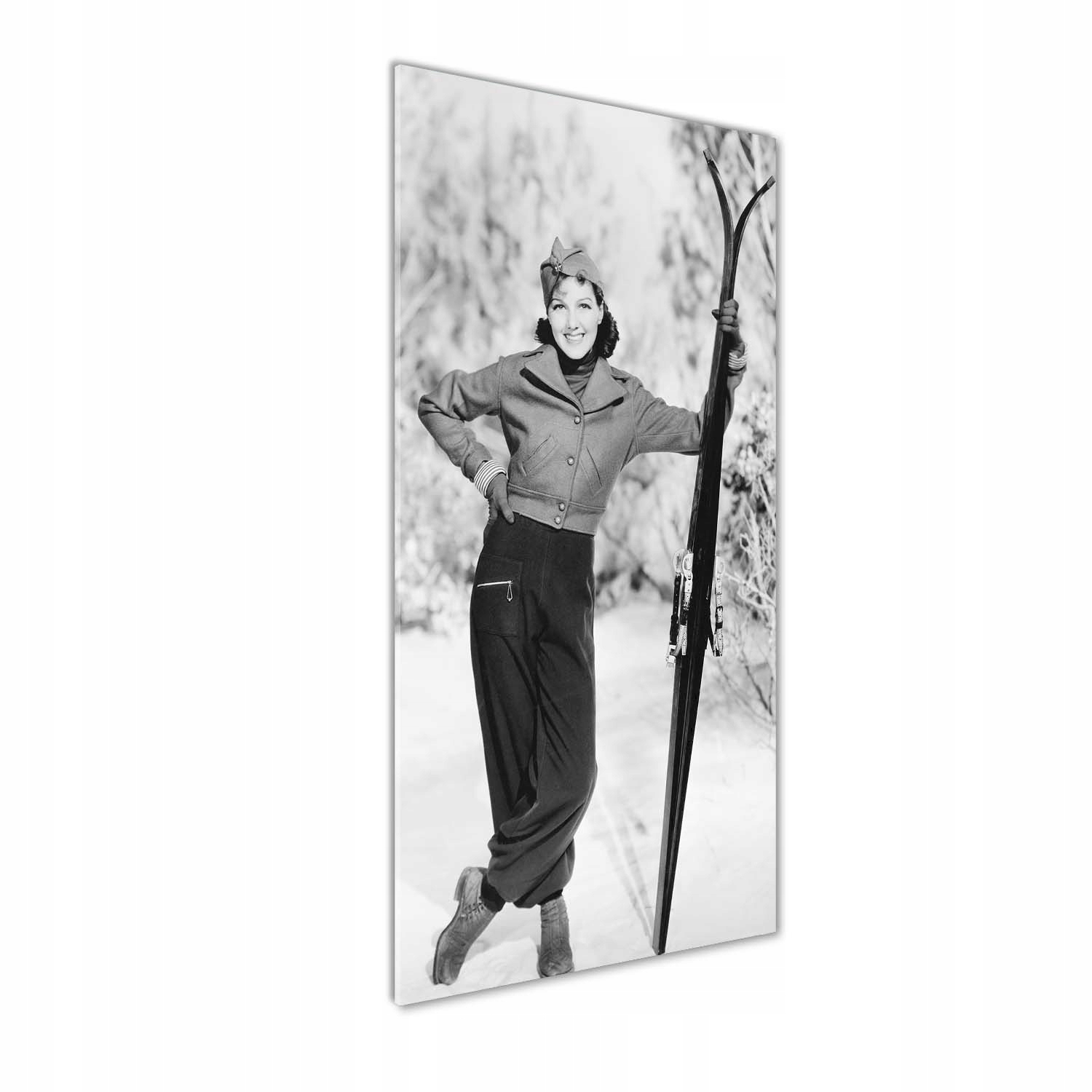 

Foto obraz na szkle Kobieta z nartami 50x125 cm