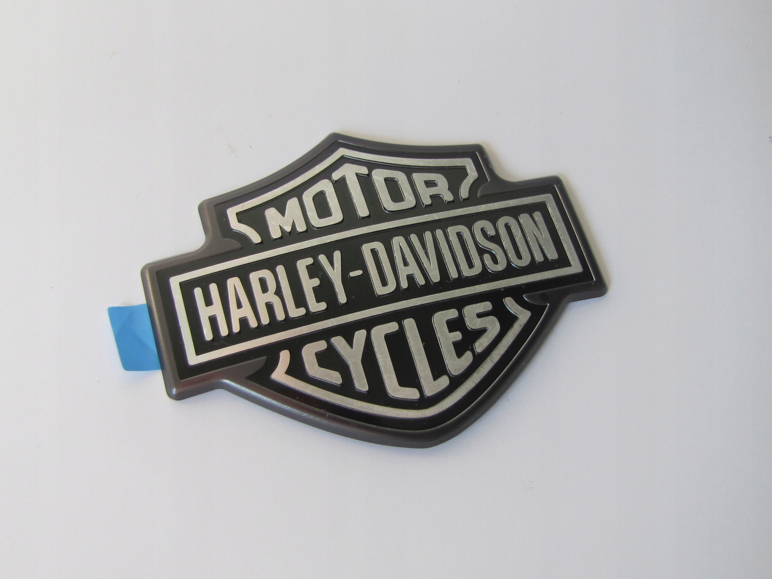 62445-10 - Емблема бака зліва FAT BOB Wide GLIDE Harley