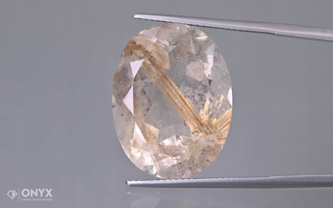 Křemen s rutilem fazetovaný ovál 21,5x16,5 mm