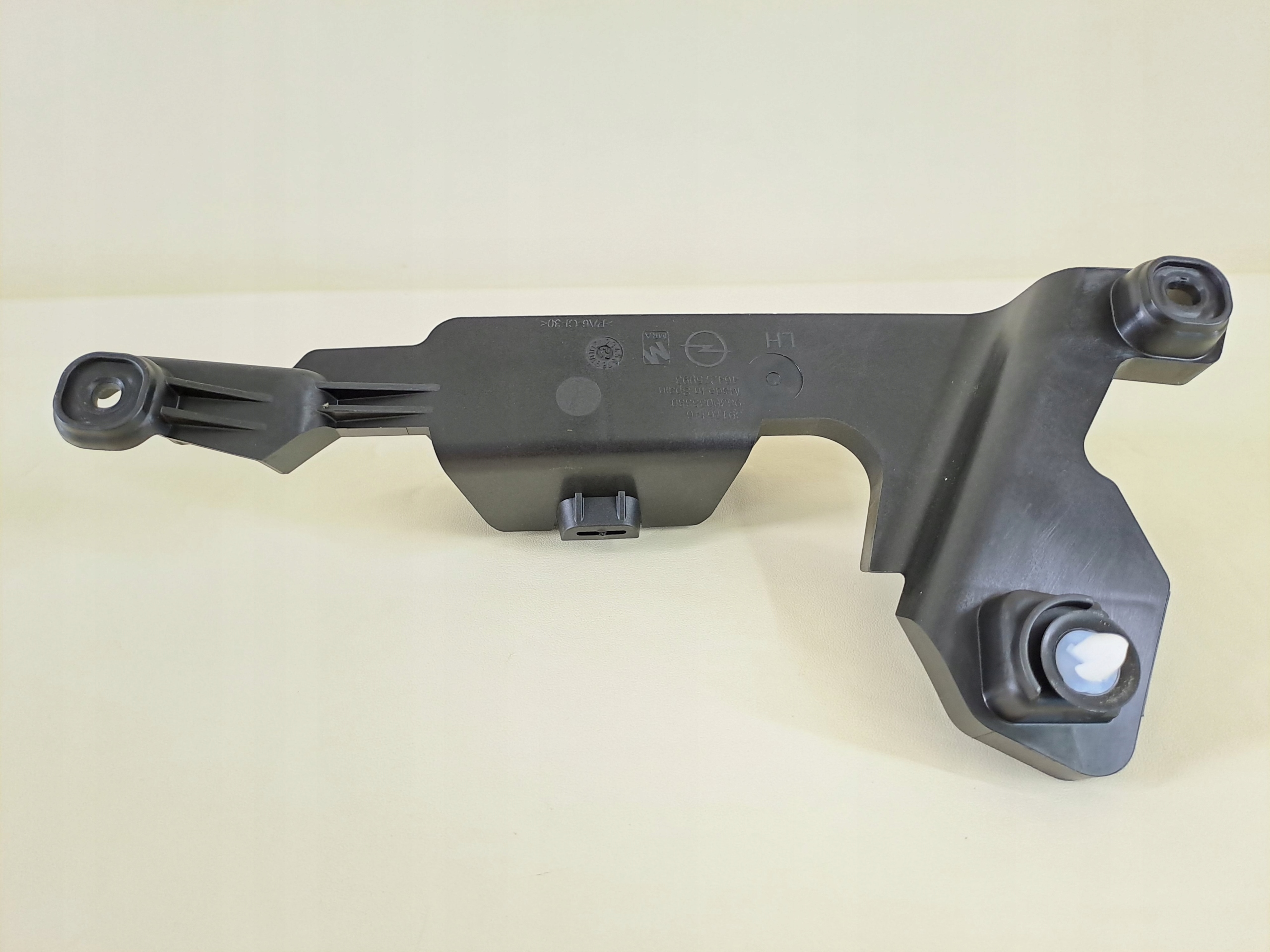 CORSA F 21r WSPORNIK KLAMKI WEWNĘTRZNEJ LEWY TYŁ Producent części Opel OE