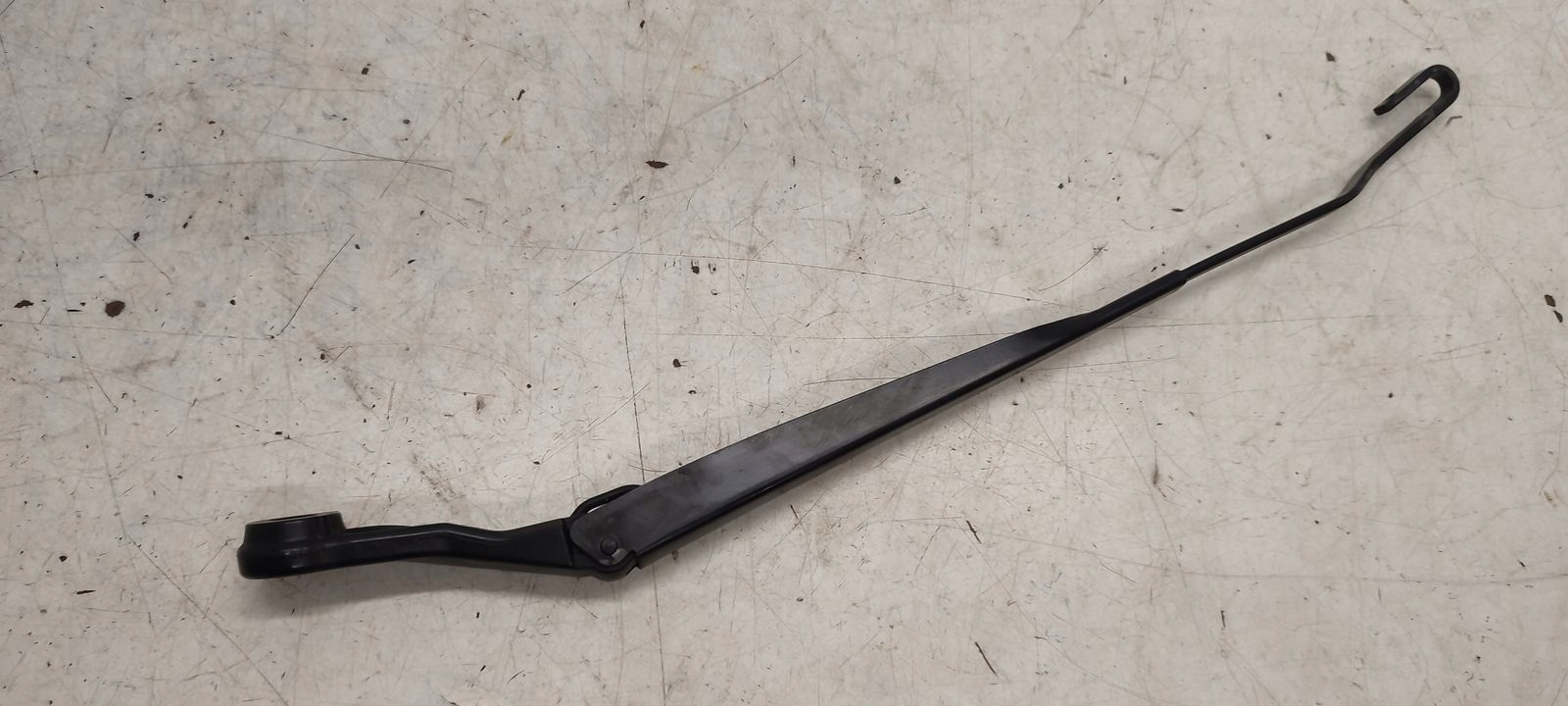 wiper arm left Nissan Micra K12 1,2 12V 3D