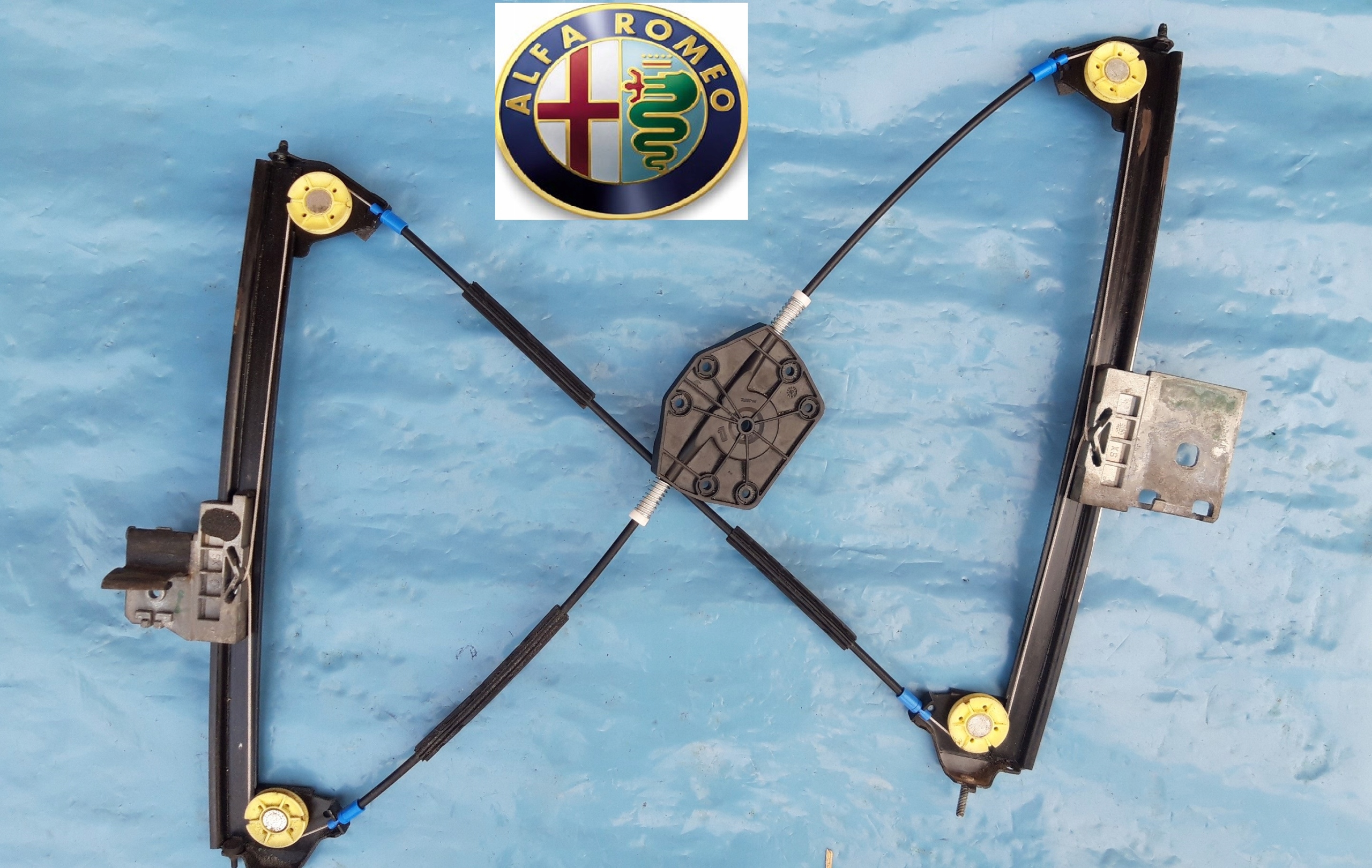 Alfa Romeo SPIDER Podnośnik szyby Lewy NOWE W-WA