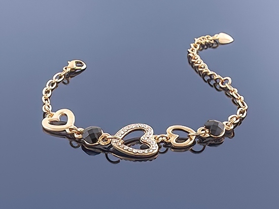 

Złota bransoletka Charms