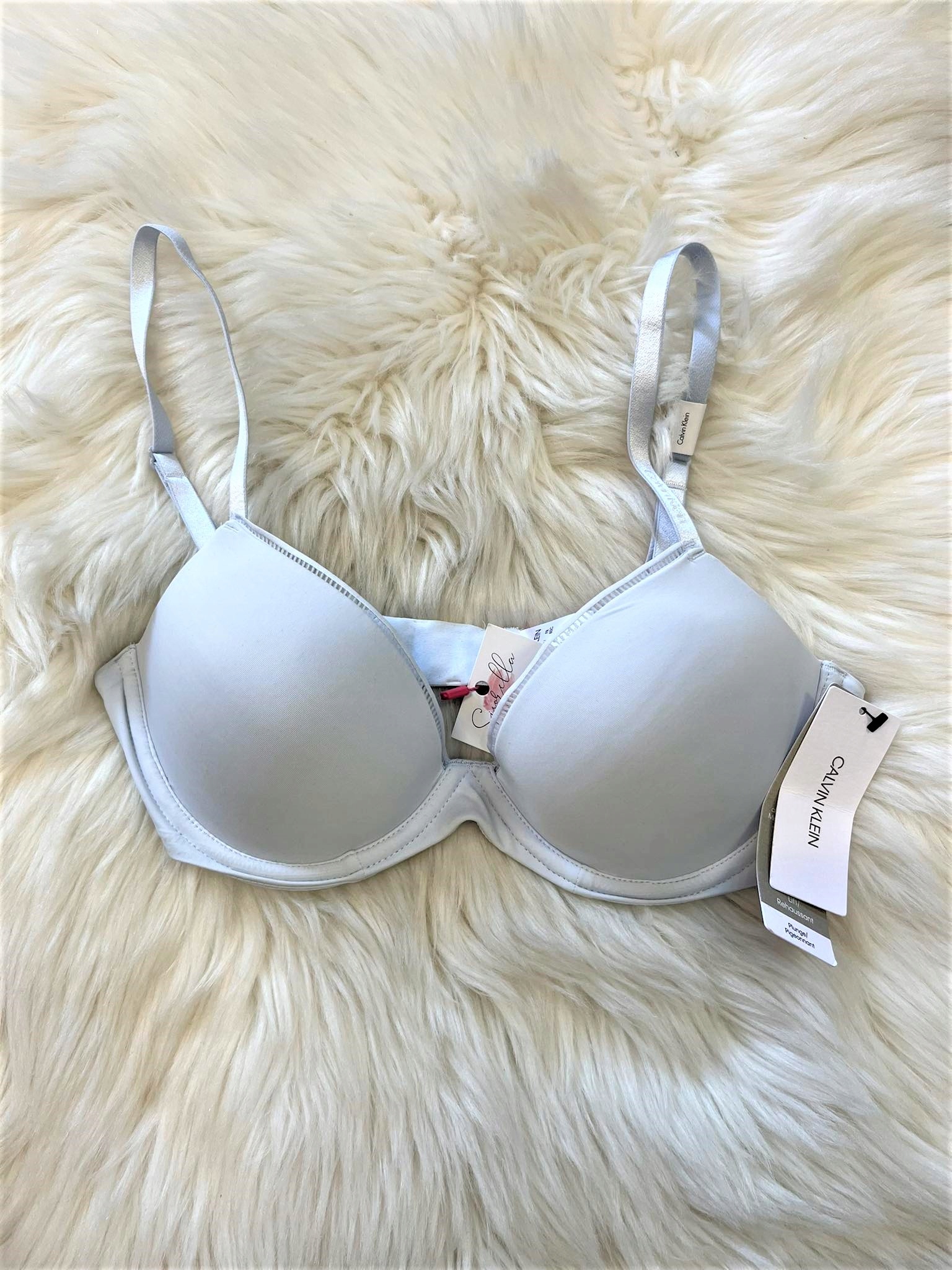 https://a.allegroimg.com/original/118712/174f46a14fb198d3f83974cf32c7/Biustonosz-Calvin-Klein-lift-plunge-70C