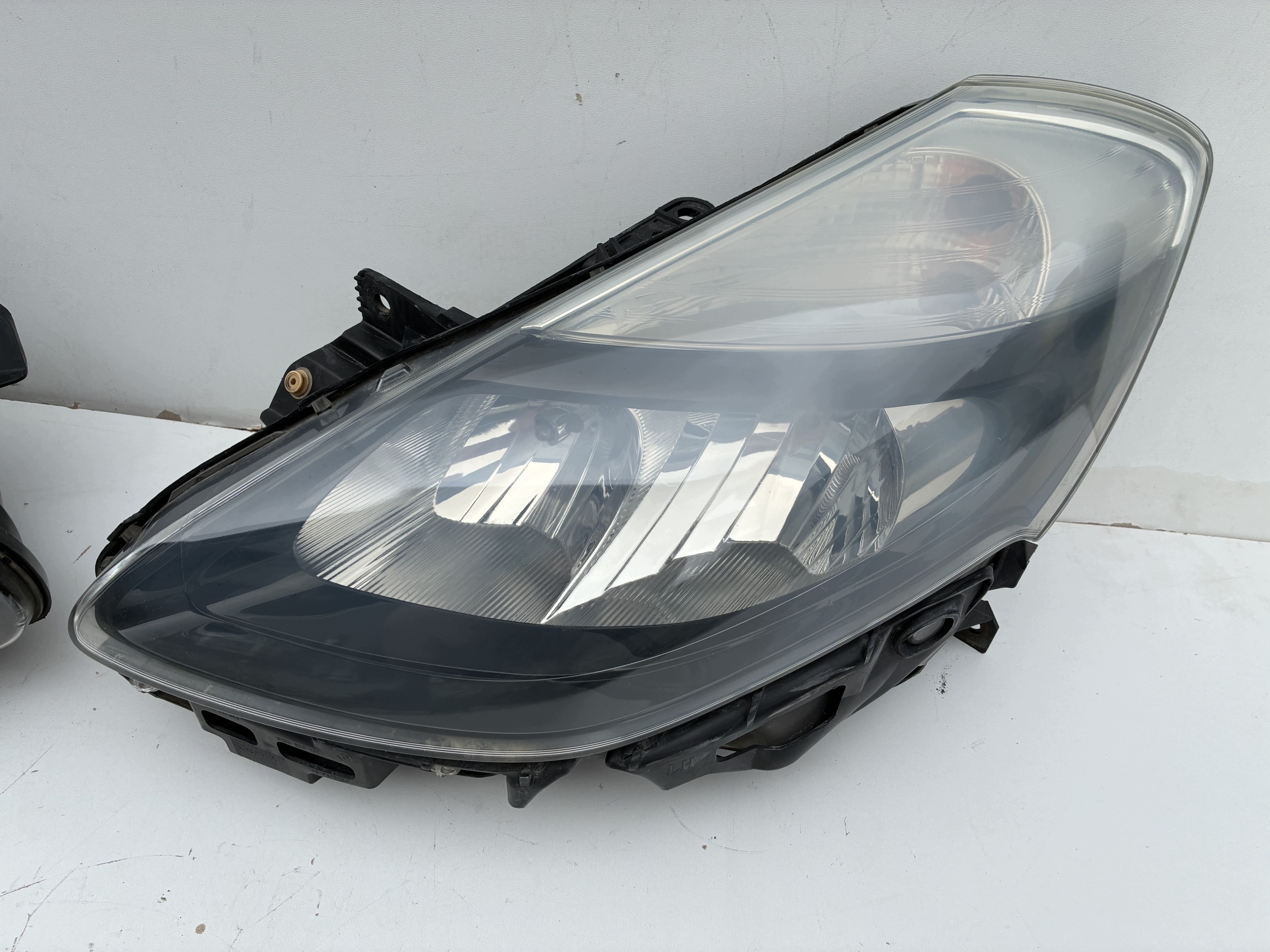 Reflektor light front front right left Renault Clio III Lift 09-12r. Eu