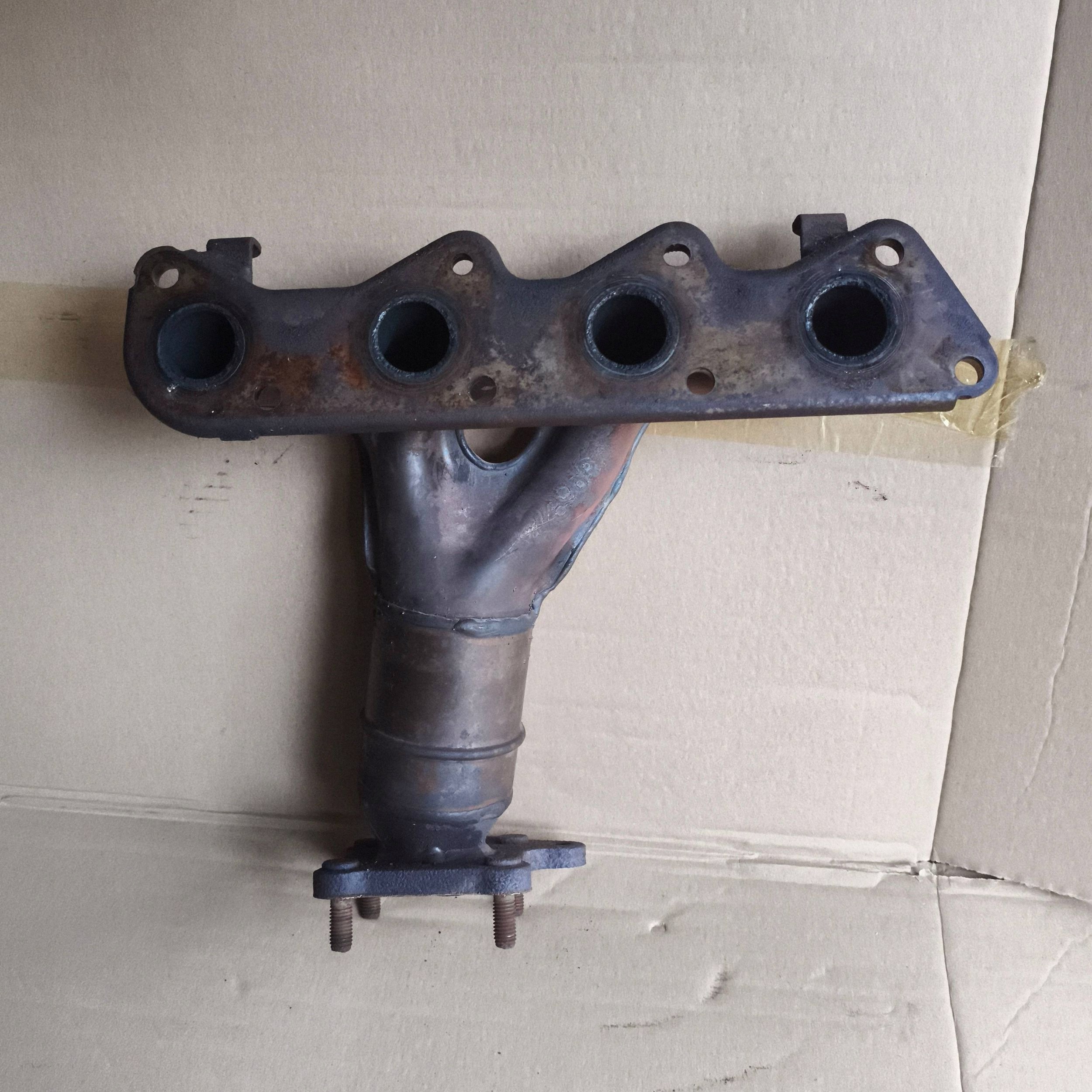 exhaust manifold Volkswagen Polo III 6N 6N2 6NF 1.0 2000