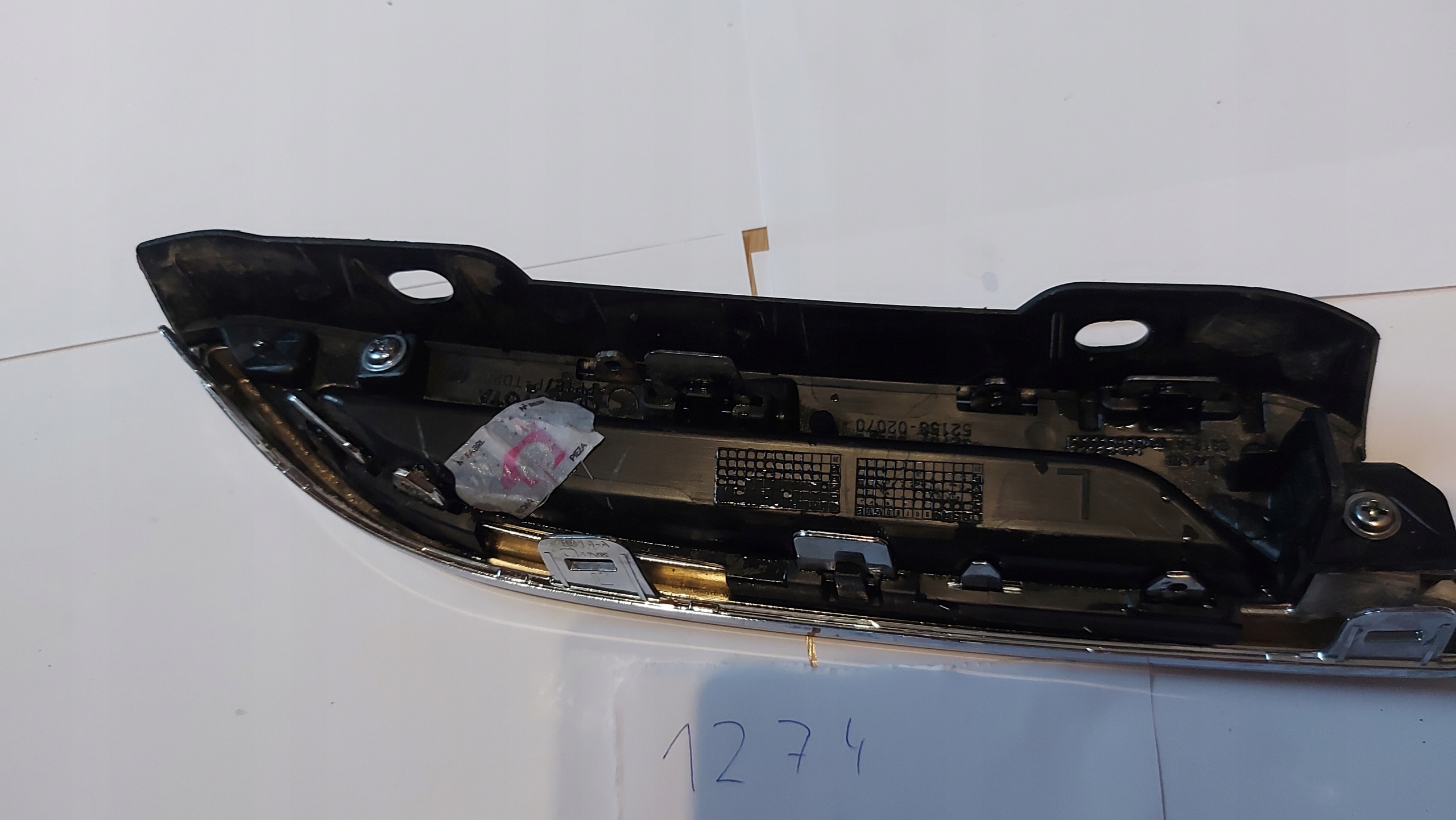 moulding grid CHROM of a bumper left left rear part rear TOYOTA COROLLA E21 HB 19