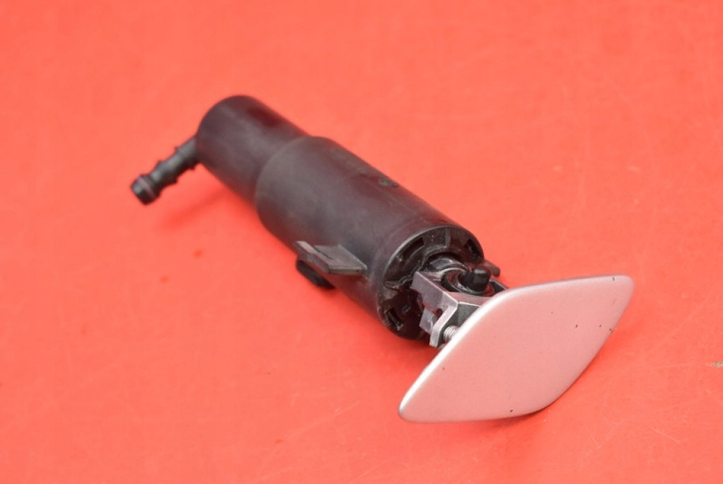 washer REFLEKTOROW left SREBRNY 7179311-02 BMW E93 04-10